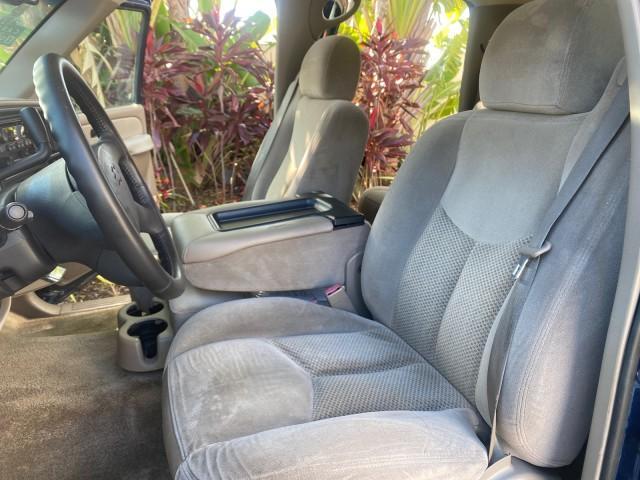2003 Indigo Blue Metallic /Tan/Neutral Chevrolet Suburban LT 1 OWNER NO ACCIDENTS (1GNEC16Z13R) with an 5.3L Vortec 5300 V8 SFI Bi-Fuel Engine engine, Automatic transmission, located at 4701 North Dixie Hwy, Pompano Beach, FL, 33064, (954) 422-2889, 26.240938, -80.123474 - OUR WEBPAGE FLORIDACARS1.COM HAS OVER 100 PHOTOS AND FREE CARFAX LINK 2003 CHEVROLET SUBURBAN 1500 LS VIN: 1GNEC16Z13R307421 1 G N E C 1 6 Z 1 3 R 3 0 7 4 2 1 4 DOOR WAGON/SPORT UTILITY 5.3L V8 F FLEX FUEL 18 MPG REAR WHEEL DRIVE Features ABS Brakes Air Conditioning Alloy Wheels AM/FM Stereo Automat - Photo#10
