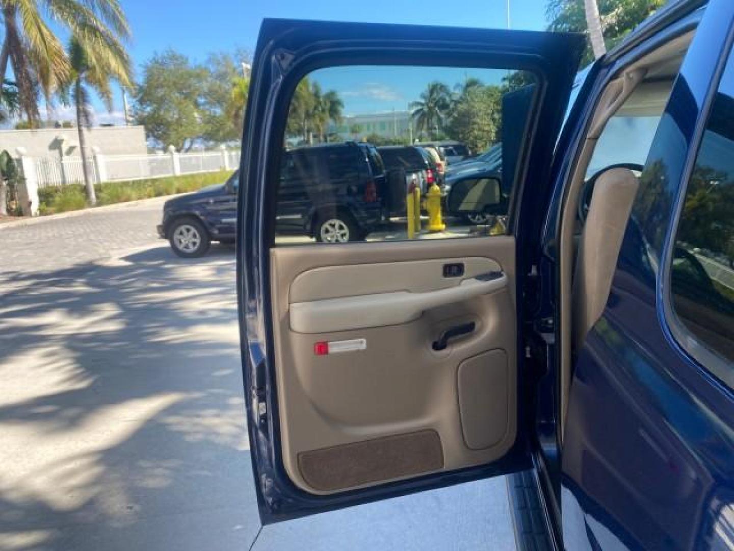 2003 Indigo Blue Metallic /Tan/Neutral Chevrolet Suburban LT 1 OWNER NO ACCIDENTS (1GNEC16Z13R) with an 5.3L Vortec 5300 V8 SFI Bi-Fuel Engine engine, Automatic transmission, located at 4701 North Dixie Hwy, Pompano Beach, FL, 33064, (954) 422-2889, 26.240938, -80.123474 - OUR WEBPAGE FLORIDACARS1.COM HAS OVER 100 PHOTOS AND FREE CARFAX LINK 2003 CHEVROLET SUBURBAN 1500 LS VIN: 1GNEC16Z13R307421 1 G N E C 1 6 Z 1 3 R 3 0 7 4 2 1 4 DOOR WAGON/SPORT UTILITY 5.3L V8 F FLEX FUEL 18 MPG REAR WHEEL DRIVE Features ABS Brakes Air Conditioning Alloy Wheels AM/FM Stereo Automat - Photo#13