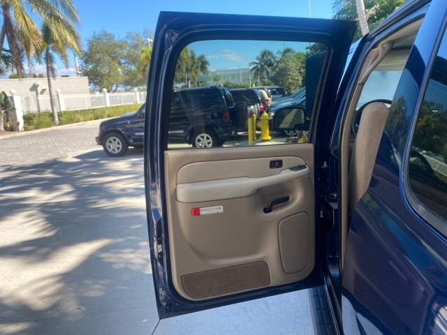 2003 Indigo Blue Metallic /Tan/Neutral Chevrolet Suburban LT 1 OWNER NO ACCIDENTS (1GNEC16Z13R) with an 5.3L Vortec 5300 V8 SFI Bi-Fuel Engine engine, Automatic transmission, located at 4701 North Dixie Hwy, Pompano Beach, FL, 33064, (954) 422-2889, 26.240938, -80.123474 - OUR WEBPAGE FLORIDACARS1.COM HAS OVER 100 PHOTOS AND FREE CARFAX LINK 2003 CHEVROLET SUBURBAN 1500 LS VIN: 1GNEC16Z13R307421 1 G N E C 1 6 Z 1 3 R 3 0 7 4 2 1 4 DOOR WAGON/SPORT UTILITY 5.3L V8 F FLEX FUEL 18 MPG REAR WHEEL DRIVE Features ABS Brakes Air Conditioning Alloy Wheels AM/FM Stereo Automat - Photo#13