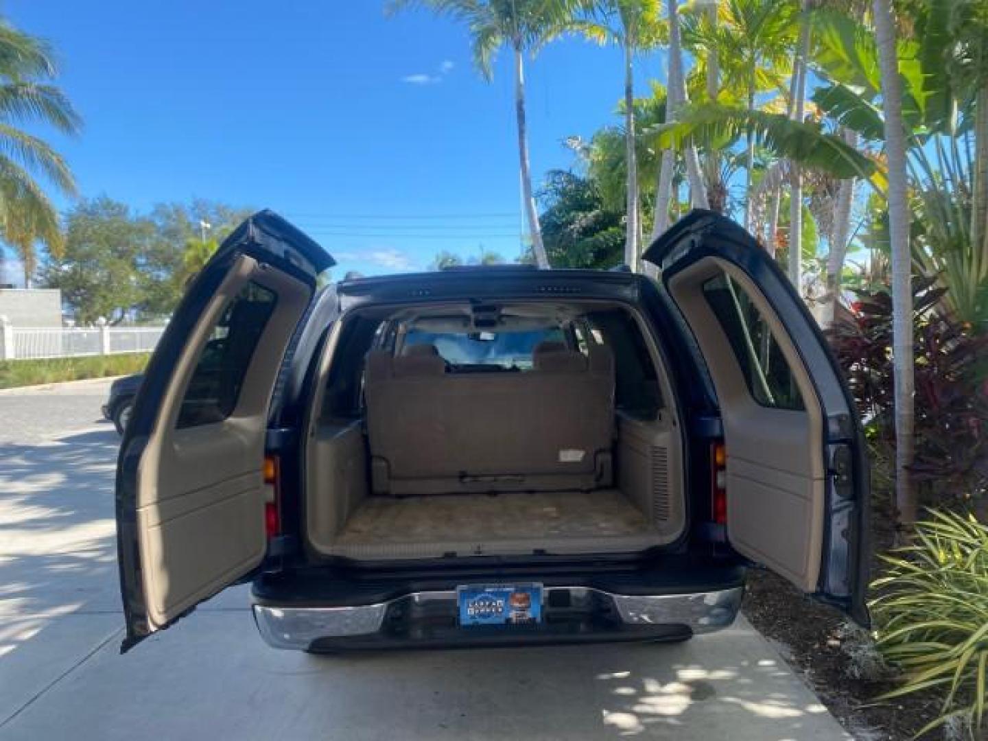 2003 Indigo Blue Metallic /Tan/Neutral Chevrolet Suburban LT 1 OWNER NO ACCIDENTS (1GNEC16Z13R) with an 5.3L Vortec 5300 V8 SFI Bi-Fuel Engine engine, Automatic transmission, located at 4701 North Dixie Hwy, Pompano Beach, FL, 33064, (954) 422-2889, 26.240938, -80.123474 - OUR WEBPAGE FLORIDACARS1.COM HAS OVER 100 PHOTOS AND FREE CARFAX LINK 2003 CHEVROLET SUBURBAN 1500 LS VIN: 1GNEC16Z13R307421 1 G N E C 1 6 Z 1 3 R 3 0 7 4 2 1 4 DOOR WAGON/SPORT UTILITY 5.3L V8 F FLEX FUEL 18 MPG REAR WHEEL DRIVE Features ABS Brakes Air Conditioning Alloy Wheels AM/FM Stereo Automat - Photo#15