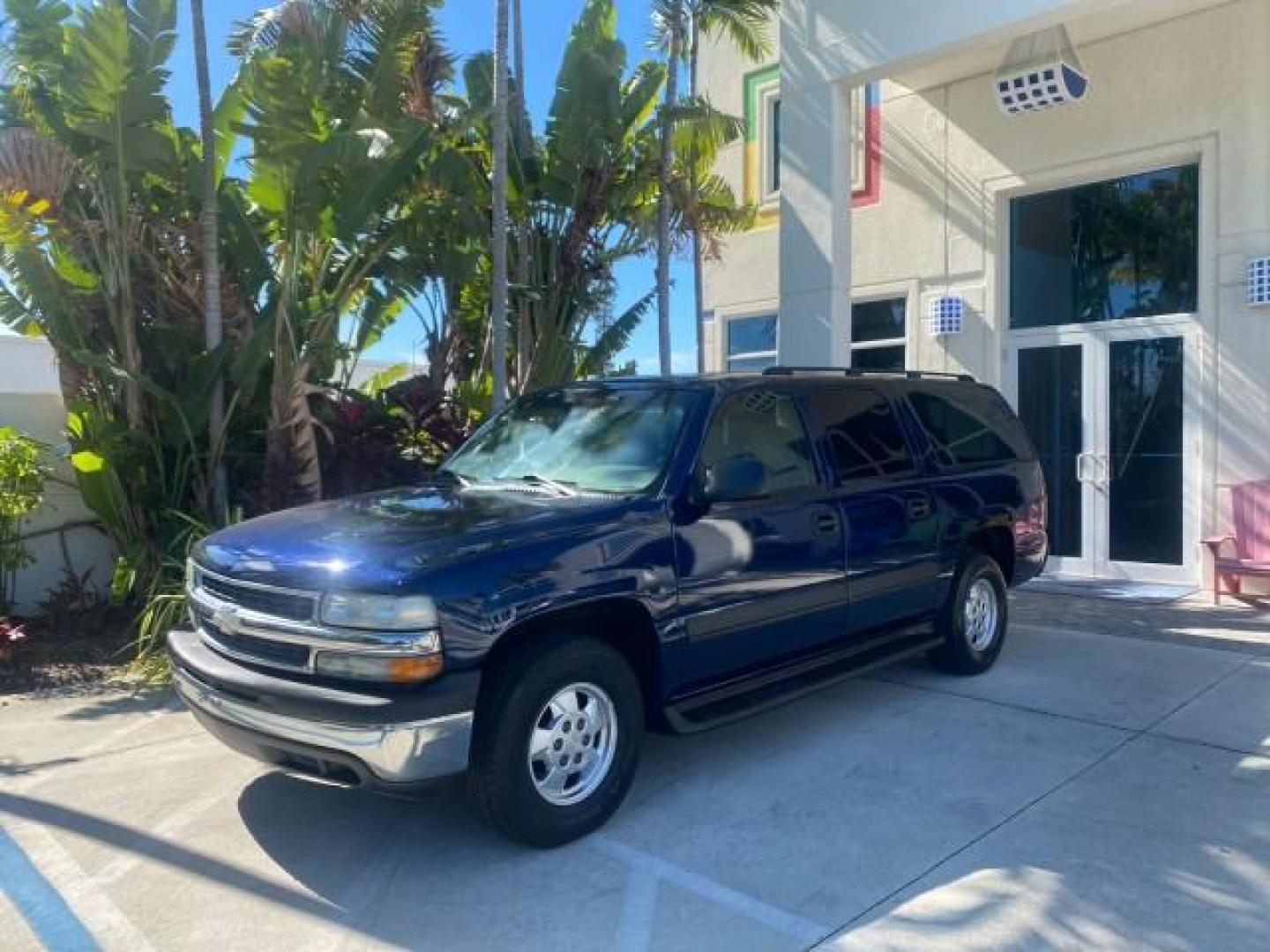 2003 Indigo Blue Metallic /Tan/Neutral Chevrolet Suburban LT 1 OWNER NO ACCIDENTS (1GNEC16Z13R) with an 5.3L Vortec 5300 V8 SFI Bi-Fuel Engine engine, Automatic transmission, located at 4701 North Dixie Hwy, Pompano Beach, FL, 33064, (954) 422-2889, 26.240938, -80.123474 - OUR WEBPAGE FLORIDACARS1.COM HAS OVER 100 PHOTOS AND FREE CARFAX LINK 2003 CHEVROLET SUBURBAN 1500 LS VIN: 1GNEC16Z13R307421 1 G N E C 1 6 Z 1 3 R 3 0 7 4 2 1 4 DOOR WAGON/SPORT UTILITY 5.3L V8 F FLEX FUEL 18 MPG REAR WHEEL DRIVE Features ABS Brakes Air Conditioning Alloy Wheels AM/FM Stereo Automat - Photo#29