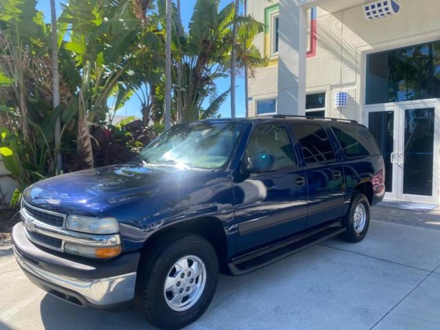 2003 Indigo Blue Metallic /Tan/Neutral Chevrolet Suburban LT 1 OWNER NO ACCIDENTS (1GNEC16Z13R) with an 5.3L Vortec 5300 V8 SFI Bi-Fuel Engine engine, Automatic transmission, located at 4701 North Dixie Hwy, Pompano Beach, FL, 33064, (954) 422-2889, 26.240938, -80.123474 - OUR WEBPAGE FLORIDACARS1.COM HAS OVER 100 PHOTOS AND FREE CARFAX LINK 2003 CHEVROLET SUBURBAN 1500 LS VIN: 1GNEC16Z13R307421 1 G N E C 1 6 Z 1 3 R 3 0 7 4 2 1 4 DOOR WAGON/SPORT UTILITY 5.3L V8 F FLEX FUEL 18 MPG REAR WHEEL DRIVE Features ABS Brakes Air Conditioning Alloy Wheels AM/FM Stereo Automat - Photo#30