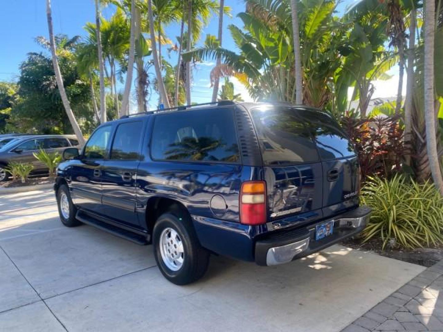 2003 Indigo Blue Metallic /Tan/Neutral Chevrolet Suburban LT 1 OWNER NO ACCIDENTS (1GNEC16Z13R) with an 5.3L Vortec 5300 V8 SFI Bi-Fuel Engine engine, Automatic transmission, located at 4701 North Dixie Hwy, Pompano Beach, FL, 33064, (954) 422-2889, 26.240938, -80.123474 - OUR WEBPAGE FLORIDACARS1.COM HAS OVER 100 PHOTOS AND FREE CARFAX LINK 2003 CHEVROLET SUBURBAN 1500 LS VIN: 1GNEC16Z13R307421 1 G N E C 1 6 Z 1 3 R 3 0 7 4 2 1 4 DOOR WAGON/SPORT UTILITY 5.3L V8 F FLEX FUEL 18 MPG REAR WHEEL DRIVE Features ABS Brakes Air Conditioning Alloy Wheels AM/FM Stereo Automat - Photo#33