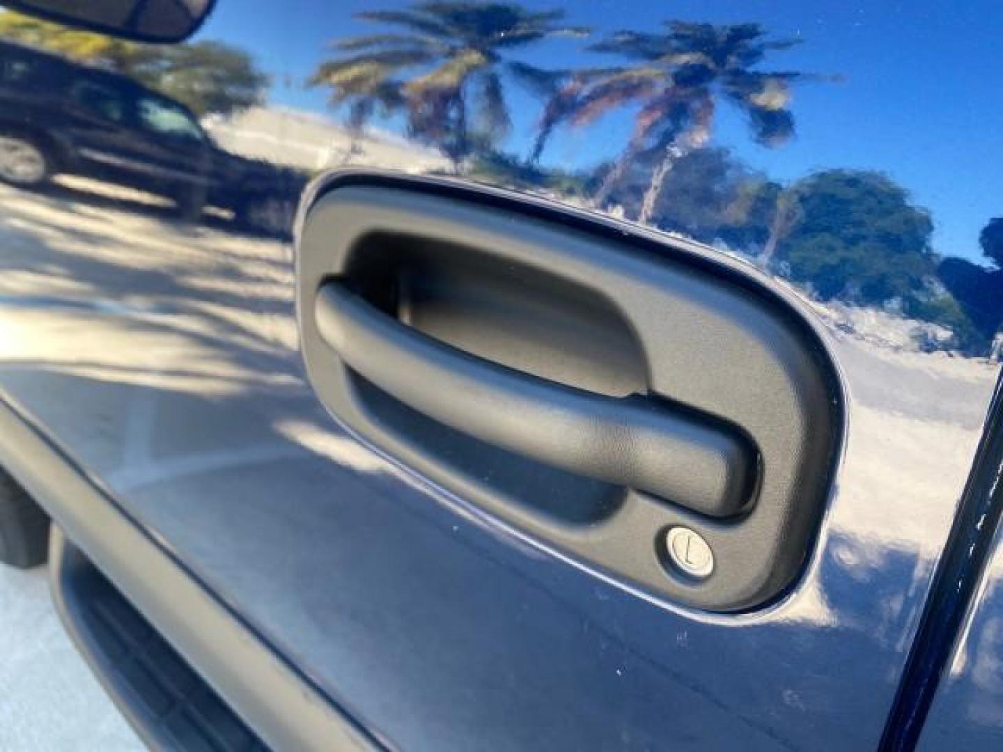 2003 Indigo Blue Metallic /Tan/Neutral Chevrolet Suburban LT 1 OWNER NO ACCIDENTS (1GNEC16Z13R) with an 5.3L Vortec 5300 V8 SFI Bi-Fuel Engine engine, Automatic transmission, located at 4701 North Dixie Hwy, Pompano Beach, FL, 33064, (954) 422-2889, 26.240938, -80.123474 - OUR WEBPAGE FLORIDACARS1.COM HAS OVER 100 PHOTOS AND FREE CARFAX LINK 2003 CHEVROLET SUBURBAN 1500 LS VIN: 1GNEC16Z13R307421 1 G N E C 1 6 Z 1 3 R 3 0 7 4 2 1 4 DOOR WAGON/SPORT UTILITY 5.3L V8 F FLEX FUEL 18 MPG REAR WHEEL DRIVE Features ABS Brakes Air Conditioning Alloy Wheels AM/FM Stereo Automat - Photo#38