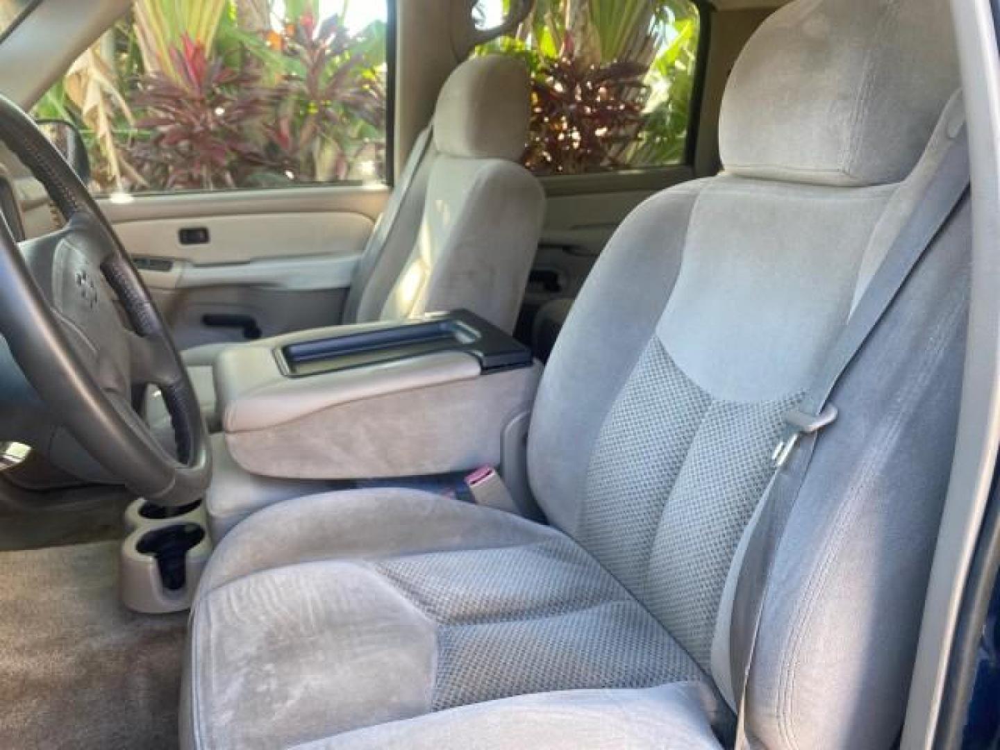 2003 Indigo Blue Metallic /Tan/Neutral Chevrolet Suburban LT 1 OWNER NO ACCIDENTS (1GNEC16Z13R) with an 5.3L Vortec 5300 V8 SFI Bi-Fuel Engine engine, Automatic transmission, located at 4701 North Dixie Hwy, Pompano Beach, FL, 33064, (954) 422-2889, 26.240938, -80.123474 - OUR WEBPAGE FLORIDACARS1.COM HAS OVER 100 PHOTOS AND FREE CARFAX LINK 2003 CHEVROLET SUBURBAN 1500 LS VIN: 1GNEC16Z13R307421 1 G N E C 1 6 Z 1 3 R 3 0 7 4 2 1 4 DOOR WAGON/SPORT UTILITY 5.3L V8 F FLEX FUEL 18 MPG REAR WHEEL DRIVE Features ABS Brakes Air Conditioning Alloy Wheels AM/FM Stereo Automat - Photo#42