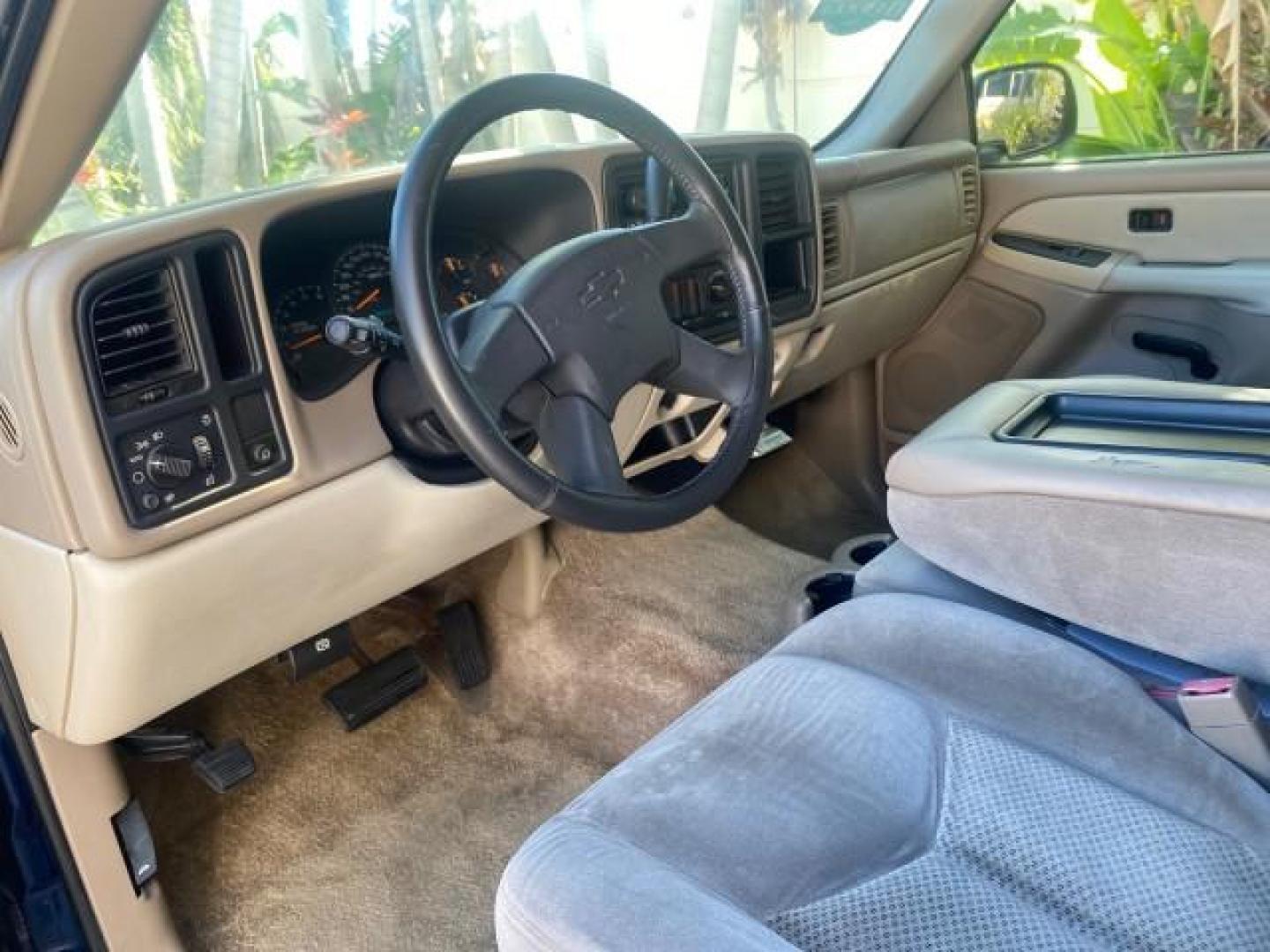 2003 Indigo Blue Metallic /Tan/Neutral Chevrolet Suburban LT 1 OWNER NO ACCIDENTS (1GNEC16Z13R) with an 5.3L Vortec 5300 V8 SFI Bi-Fuel Engine engine, Automatic transmission, located at 4701 North Dixie Hwy, Pompano Beach, FL, 33064, (954) 422-2889, 26.240938, -80.123474 - OUR WEBPAGE FLORIDACARS1.COM HAS OVER 100 PHOTOS AND FREE CARFAX LINK 2003 CHEVROLET SUBURBAN 1500 LS VIN: 1GNEC16Z13R307421 1 G N E C 1 6 Z 1 3 R 3 0 7 4 2 1 4 DOOR WAGON/SPORT UTILITY 5.3L V8 F FLEX FUEL 18 MPG REAR WHEEL DRIVE Features ABS Brakes Air Conditioning Alloy Wheels AM/FM Stereo Automat - Photo#47