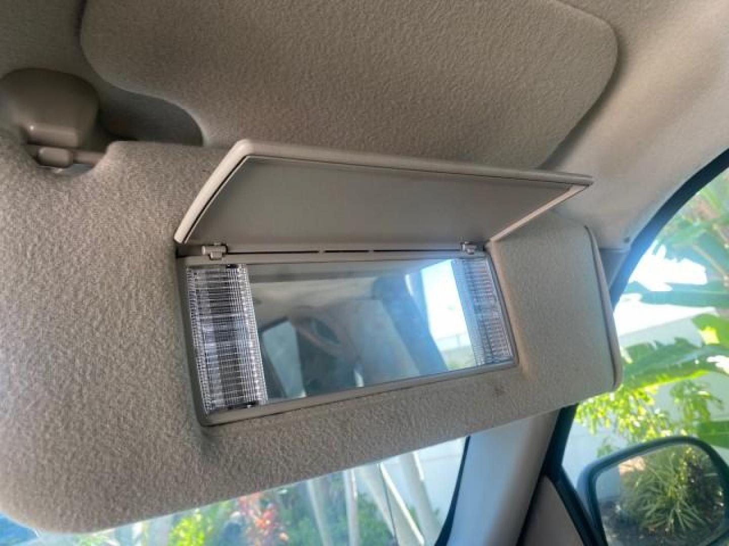 2003 Indigo Blue Metallic /Tan/Neutral Chevrolet Suburban LT 1 OWNER NO ACCIDENTS (1GNEC16Z13R) with an 5.3L Vortec 5300 V8 SFI Bi-Fuel Engine engine, Automatic transmission, located at 4701 North Dixie Hwy, Pompano Beach, FL, 33064, (954) 422-2889, 26.240938, -80.123474 - OUR WEBPAGE FLORIDACARS1.COM HAS OVER 100 PHOTOS AND FREE CARFAX LINK 2003 CHEVROLET SUBURBAN 1500 LS VIN: 1GNEC16Z13R307421 1 G N E C 1 6 Z 1 3 R 3 0 7 4 2 1 4 DOOR WAGON/SPORT UTILITY 5.3L V8 F FLEX FUEL 18 MPG REAR WHEEL DRIVE Features ABS Brakes Air Conditioning Alloy Wheels AM/FM Stereo Automat - Photo#64