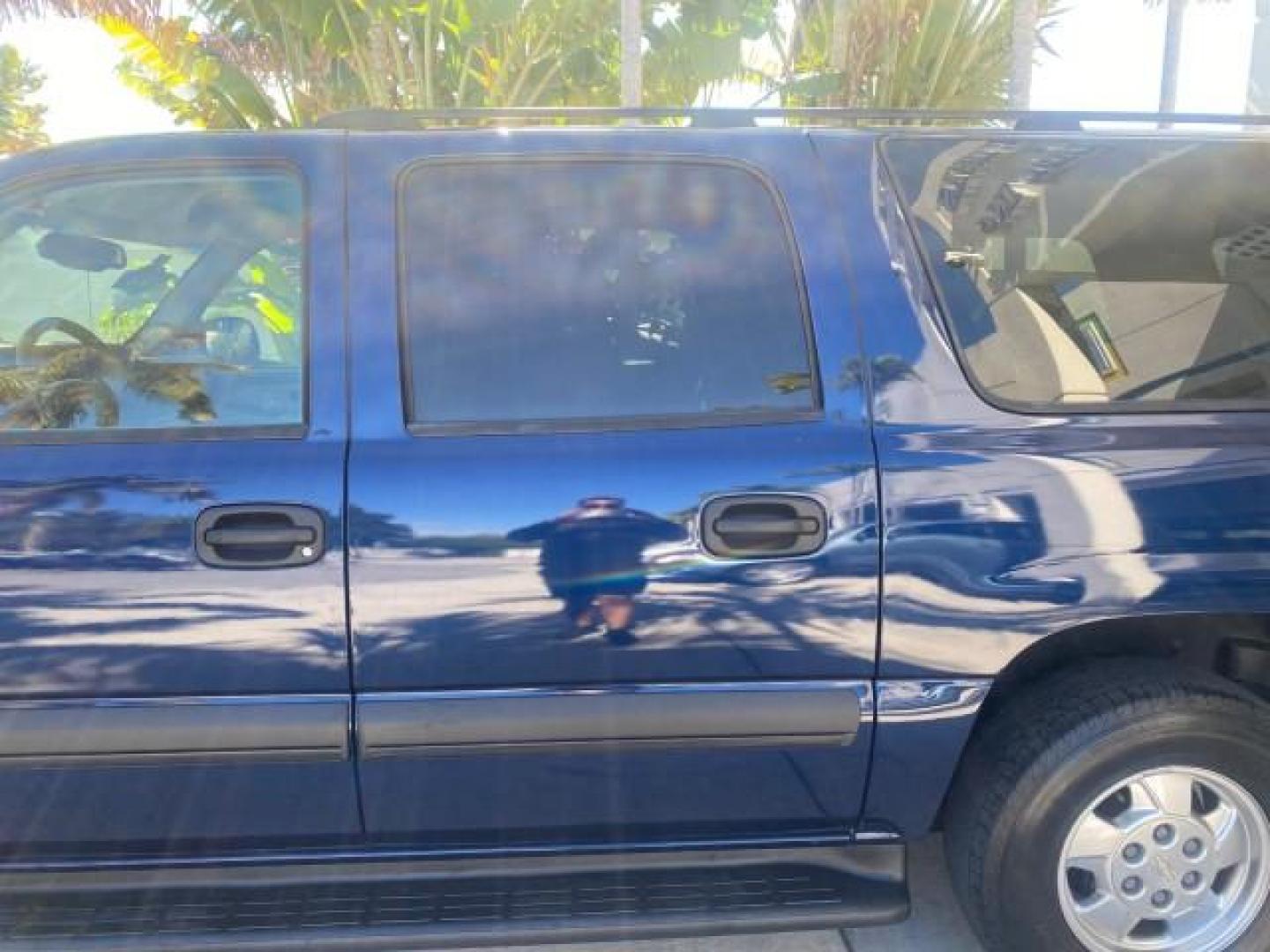 2003 Indigo Blue Metallic /Tan/Neutral Chevrolet Suburban LT 1 OWNER NO ACCIDENTS (1GNEC16Z13R) with an 5.3L Vortec 5300 V8 SFI Bi-Fuel Engine engine, Automatic transmission, located at 4701 North Dixie Hwy, Pompano Beach, FL, 33064, (954) 422-2889, 26.240938, -80.123474 - OUR WEBPAGE FLORIDACARS1.COM HAS OVER 100 PHOTOS AND FREE CARFAX LINK 2003 CHEVROLET SUBURBAN 1500 LS VIN: 1GNEC16Z13R307421 1 G N E C 1 6 Z 1 3 R 3 0 7 4 2 1 4 DOOR WAGON/SPORT UTILITY 5.3L V8 F FLEX FUEL 18 MPG REAR WHEEL DRIVE Features ABS Brakes Air Conditioning Alloy Wheels AM/FM Stereo Automat - Photo#69