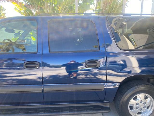 2003 Indigo Blue Metallic /Tan/Neutral Chevrolet Suburban LT 1 OWNER NO ACCIDENTS (1GNEC16Z13R) with an 5.3L Vortec 5300 V8 SFI Bi-Fuel Engine engine, Automatic transmission, located at 4701 North Dixie Hwy, Pompano Beach, FL, 33064, (954) 422-2889, 26.240938, -80.123474 - OUR WEBPAGE FLORIDACARS1.COM HAS OVER 100 PHOTOS AND FREE CARFAX LINK 2003 CHEVROLET SUBURBAN 1500 LS VIN: 1GNEC16Z13R307421 1 G N E C 1 6 Z 1 3 R 3 0 7 4 2 1 4 DOOR WAGON/SPORT UTILITY 5.3L V8 F FLEX FUEL 18 MPG REAR WHEEL DRIVE Features ABS Brakes Air Conditioning Alloy Wheels AM/FM Stereo Automat - Photo#69