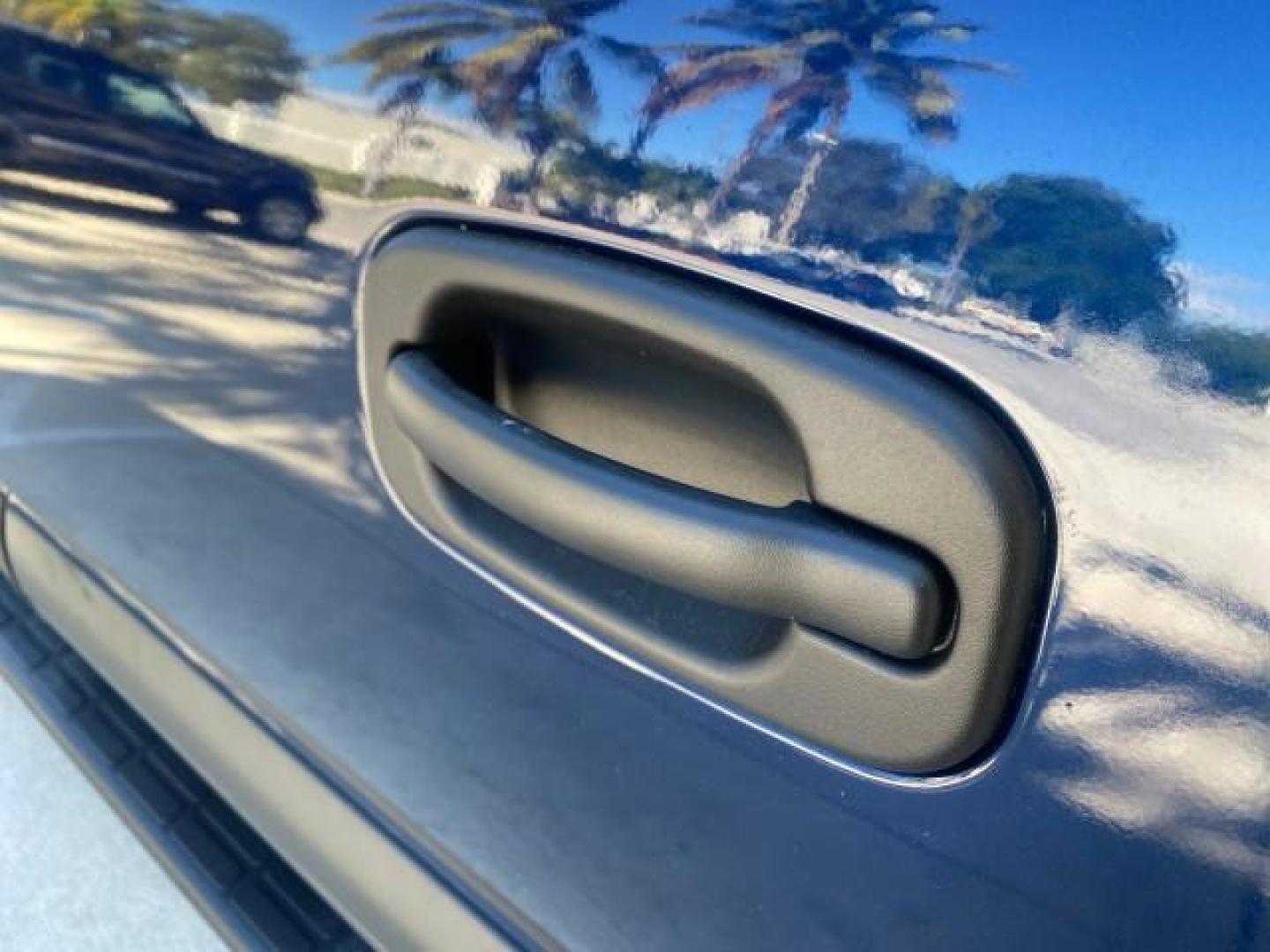 2003 Indigo Blue Metallic /Tan/Neutral Chevrolet Suburban LT 1 OWNER NO ACCIDENTS (1GNEC16Z13R) with an 5.3L Vortec 5300 V8 SFI Bi-Fuel Engine engine, Automatic transmission, located at 4701 North Dixie Hwy, Pompano Beach, FL, 33064, (954) 422-2889, 26.240938, -80.123474 - OUR WEBPAGE FLORIDACARS1.COM HAS OVER 100 PHOTOS AND FREE CARFAX LINK 2003 CHEVROLET SUBURBAN 1500 LS VIN: 1GNEC16Z13R307421 1 G N E C 1 6 Z 1 3 R 3 0 7 4 2 1 4 DOOR WAGON/SPORT UTILITY 5.3L V8 F FLEX FUEL 18 MPG REAR WHEEL DRIVE Features ABS Brakes Air Conditioning Alloy Wheels AM/FM Stereo Automat - Photo#70