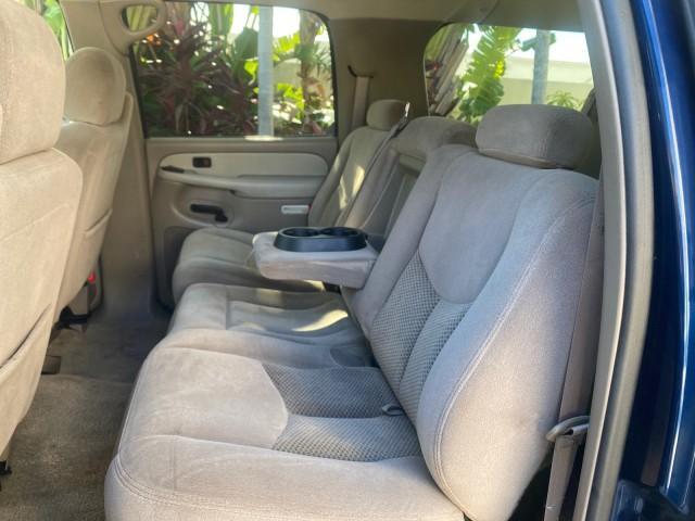 2003 Indigo Blue Metallic /Tan/Neutral Chevrolet Suburban LT 1 OWNER NO ACCIDENTS (1GNEC16Z13R) with an 5.3L Vortec 5300 V8 SFI Bi-Fuel Engine engine, Automatic transmission, located at 4701 North Dixie Hwy, Pompano Beach, FL, 33064, (954) 422-2889, 26.240938, -80.123474 - OUR WEBPAGE FLORIDACARS1.COM HAS OVER 100 PHOTOS AND FREE CARFAX LINK 2003 CHEVROLET SUBURBAN 1500 LS VIN: 1GNEC16Z13R307421 1 G N E C 1 6 Z 1 3 R 3 0 7 4 2 1 4 DOOR WAGON/SPORT UTILITY 5.3L V8 F FLEX FUEL 18 MPG REAR WHEEL DRIVE Features ABS Brakes Air Conditioning Alloy Wheels AM/FM Stereo Automat - Photo#72