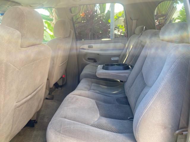 2003 Indigo Blue Metallic /Tan/Neutral Chevrolet Suburban LT 1 OWNER NO ACCIDENTS (1GNEC16Z13R) with an 5.3L Vortec 5300 V8 SFI Bi-Fuel Engine engine, Automatic transmission, located at 4701 North Dixie Hwy, Pompano Beach, FL, 33064, (954) 422-2889, 26.240938, -80.123474 - OUR WEBPAGE FLORIDACARS1.COM HAS OVER 100 PHOTOS AND FREE CARFAX LINK 2003 CHEVROLET SUBURBAN 1500 LS VIN: 1GNEC16Z13R307421 1 G N E C 1 6 Z 1 3 R 3 0 7 4 2 1 4 DOOR WAGON/SPORT UTILITY 5.3L V8 F FLEX FUEL 18 MPG REAR WHEEL DRIVE Features ABS Brakes Air Conditioning Alloy Wheels AM/FM Stereo Automat - Photo#74