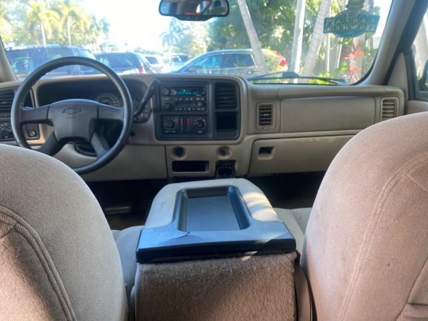 2003 Indigo Blue Metallic /Tan/Neutral Chevrolet Suburban LT 1 OWNER NO ACCIDENTS (1GNEC16Z13R) with an 5.3L Vortec 5300 V8 SFI Bi-Fuel Engine engine, Automatic transmission, located at 4701 North Dixie Hwy, Pompano Beach, FL, 33064, (954) 422-2889, 26.240938, -80.123474 - OUR WEBPAGE FLORIDACARS1.COM HAS OVER 100 PHOTOS AND FREE CARFAX LINK 2003 CHEVROLET SUBURBAN 1500 LS VIN: 1GNEC16Z13R307421 1 G N E C 1 6 Z 1 3 R 3 0 7 4 2 1 4 DOOR WAGON/SPORT UTILITY 5.3L V8 F FLEX FUEL 18 MPG REAR WHEEL DRIVE Features ABS Brakes Air Conditioning Alloy Wheels AM/FM Stereo Automat - Photo#78