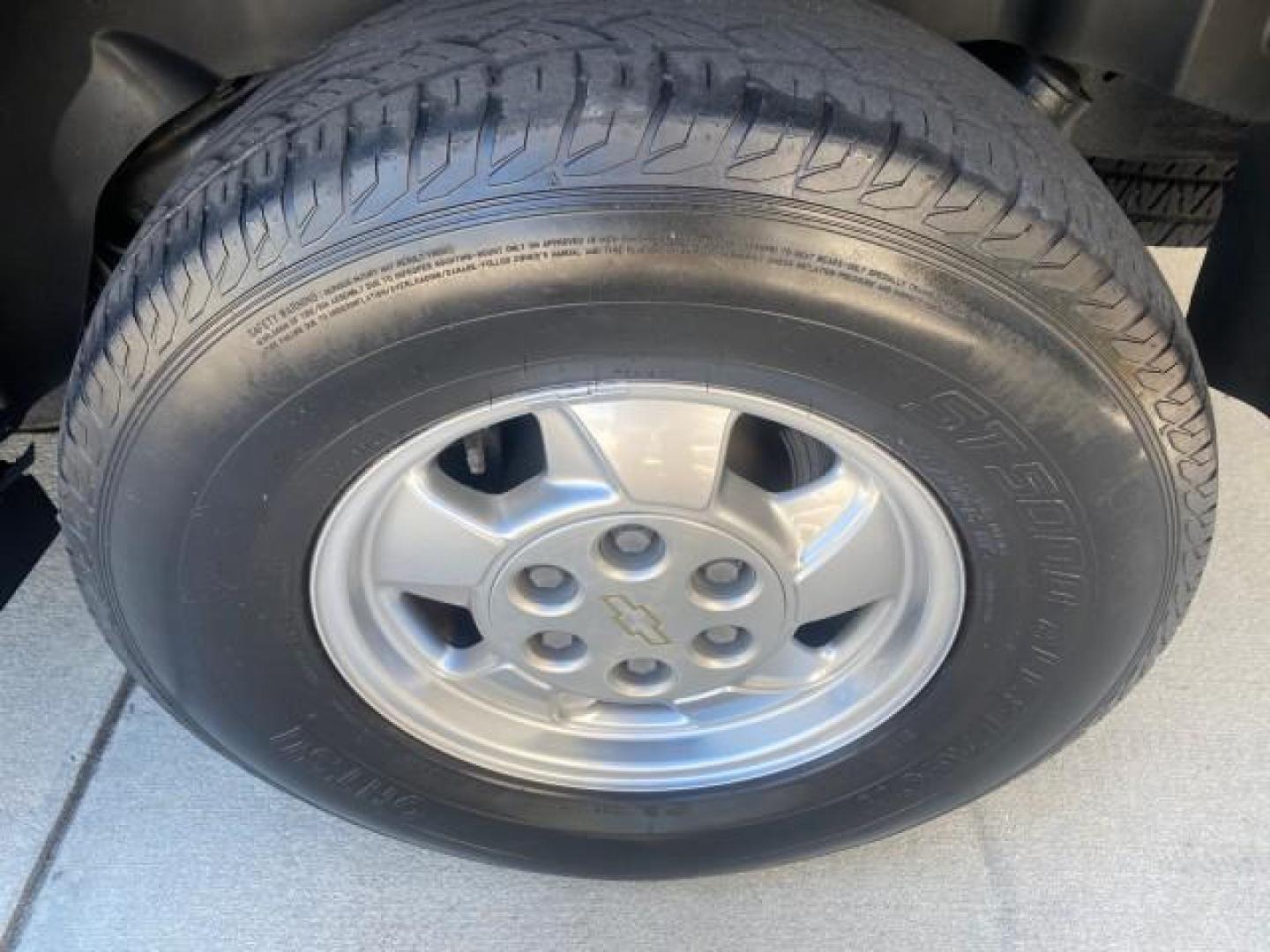 2003 Indigo Blue Metallic /Tan/Neutral Chevrolet Suburban LT 1 OWNER NO ACCIDENTS (1GNEC16Z13R) with an 5.3L Vortec 5300 V8 SFI Bi-Fuel Engine engine, Automatic transmission, located at 4701 North Dixie Hwy, Pompano Beach, FL, 33064, (954) 422-2889, 26.240938, -80.123474 - OUR WEBPAGE FLORIDACARS1.COM HAS OVER 100 PHOTOS AND FREE CARFAX LINK 2003 CHEVROLET SUBURBAN 1500 LS VIN: 1GNEC16Z13R307421 1 G N E C 1 6 Z 1 3 R 3 0 7 4 2 1 4 DOOR WAGON/SPORT UTILITY 5.3L V8 F FLEX FUEL 18 MPG REAR WHEEL DRIVE Features ABS Brakes Air Conditioning Alloy Wheels AM/FM Stereo Automat - Photo#84