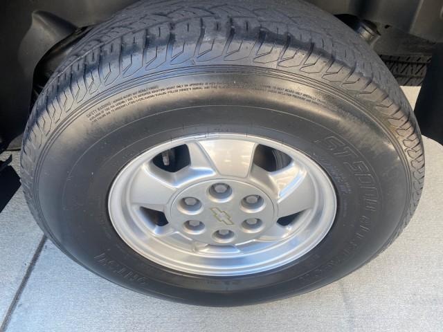 2003 Indigo Blue Metallic /Tan/Neutral Chevrolet Suburban LT 1 OWNER NO ACCIDENTS (1GNEC16Z13R) with an 5.3L Vortec 5300 V8 SFI Bi-Fuel Engine engine, Automatic transmission, located at 4701 North Dixie Hwy, Pompano Beach, FL, 33064, (954) 422-2889, 26.240938, -80.123474 - OUR WEBPAGE FLORIDACARS1.COM HAS OVER 100 PHOTOS AND FREE CARFAX LINK 2003 CHEVROLET SUBURBAN 1500 LS VIN: 1GNEC16Z13R307421 1 G N E C 1 6 Z 1 3 R 3 0 7 4 2 1 4 DOOR WAGON/SPORT UTILITY 5.3L V8 F FLEX FUEL 18 MPG REAR WHEEL DRIVE Features ABS Brakes Air Conditioning Alloy Wheels AM/FM Stereo Automat - Photo#84