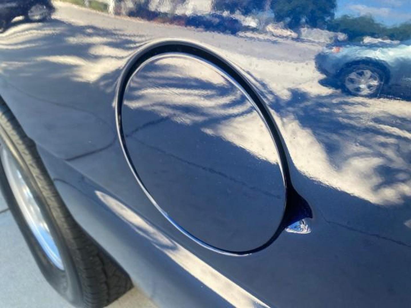 2003 Indigo Blue Metallic /Tan/Neutral Chevrolet Suburban LT 1 OWNER NO ACCIDENTS (1GNEC16Z13R) with an 5.3L Vortec 5300 V8 SFI Bi-Fuel Engine engine, Automatic transmission, located at 4701 North Dixie Hwy, Pompano Beach, FL, 33064, (954) 422-2889, 26.240938, -80.123474 - OUR WEBPAGE FLORIDACARS1.COM HAS OVER 100 PHOTOS AND FREE CARFAX LINK 2003 CHEVROLET SUBURBAN 1500 LS VIN: 1GNEC16Z13R307421 1 G N E C 1 6 Z 1 3 R 3 0 7 4 2 1 4 DOOR WAGON/SPORT UTILITY 5.3L V8 F FLEX FUEL 18 MPG REAR WHEEL DRIVE Features ABS Brakes Air Conditioning Alloy Wheels AM/FM Stereo Automat - Photo#87