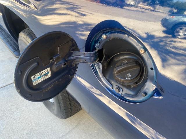 2003 Indigo Blue Metallic /Tan/Neutral Chevrolet Suburban LT 1 OWNER NO ACCIDENTS (1GNEC16Z13R) with an 5.3L Vortec 5300 V8 SFI Bi-Fuel Engine engine, Automatic transmission, located at 4701 North Dixie Hwy, Pompano Beach, FL, 33064, (954) 422-2889, 26.240938, -80.123474 - OUR WEBPAGE FLORIDACARS1.COM HAS OVER 100 PHOTOS AND FREE CARFAX LINK 2003 CHEVROLET SUBURBAN 1500 LS VIN: 1GNEC16Z13R307421 1 G N E C 1 6 Z 1 3 R 3 0 7 4 2 1 4 DOOR WAGON/SPORT UTILITY 5.3L V8 F FLEX FUEL 18 MPG REAR WHEEL DRIVE Features ABS Brakes Air Conditioning Alloy Wheels AM/FM Stereo Automat - Photo#88