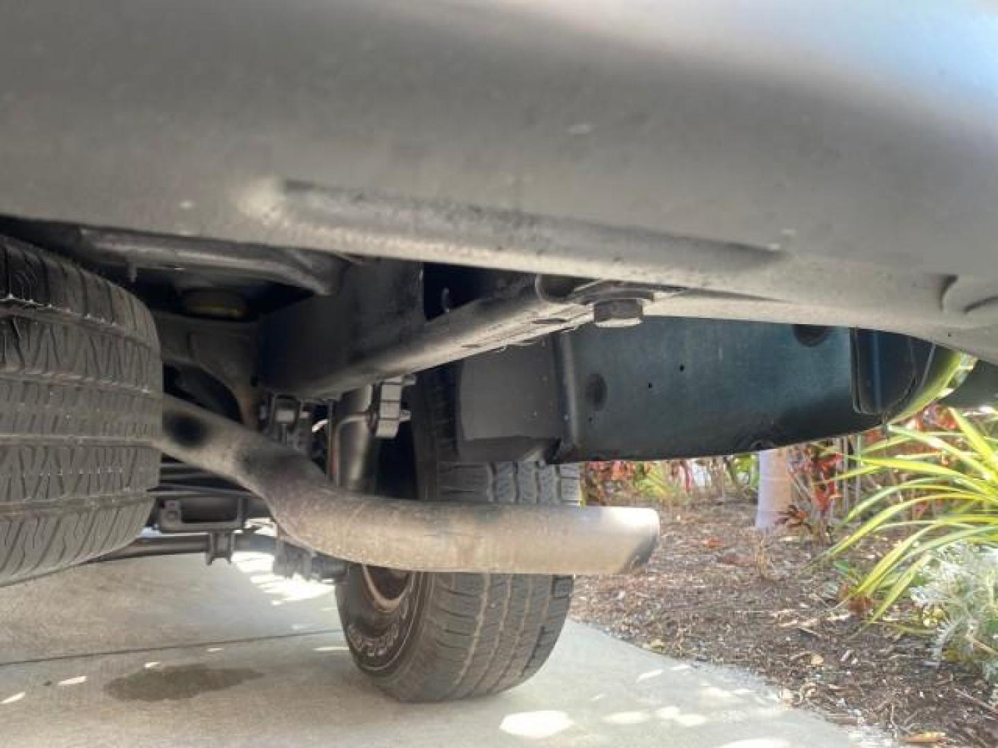 2003 Indigo Blue Metallic /Tan/Neutral Chevrolet Suburban LT 1 OWNER NO ACCIDENTS (1GNEC16Z13R) with an 5.3L Vortec 5300 V8 SFI Bi-Fuel Engine engine, Automatic transmission, located at 4701 North Dixie Hwy, Pompano Beach, FL, 33064, (954) 422-2889, 26.240938, -80.123474 - OUR WEBPAGE FLORIDACARS1.COM HAS OVER 100 PHOTOS AND FREE CARFAX LINK 2003 CHEVROLET SUBURBAN 1500 LS VIN: 1GNEC16Z13R307421 1 G N E C 1 6 Z 1 3 R 3 0 7 4 2 1 4 DOOR WAGON/SPORT UTILITY 5.3L V8 F FLEX FUEL 18 MPG REAR WHEEL DRIVE Features ABS Brakes Air Conditioning Alloy Wheels AM/FM Stereo Automat - Photo#92