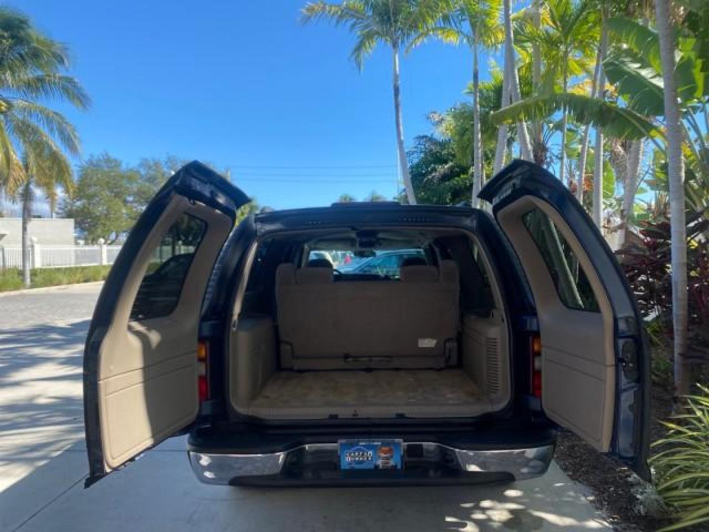 2003 Indigo Blue Metallic /Tan/Neutral Chevrolet Suburban LT 1 OWNER NO ACCIDENTS (1GNEC16Z13R) with an 5.3L Vortec 5300 V8 SFI Bi-Fuel Engine engine, Automatic transmission, located at 4701 North Dixie Hwy, Pompano Beach, FL, 33064, (954) 422-2889, 26.240938, -80.123474 - OUR WEBPAGE FLORIDACARS1.COM HAS OVER 100 PHOTOS AND FREE CARFAX LINK 2003 CHEVROLET SUBURBAN 1500 LS VIN: 1GNEC16Z13R307421 1 G N E C 1 6 Z 1 3 R 3 0 7 4 2 1 4 DOOR WAGON/SPORT UTILITY 5.3L V8 F FLEX FUEL 18 MPG REAR WHEEL DRIVE Features ABS Brakes Air Conditioning Alloy Wheels AM/FM Stereo Automat - Photo#93