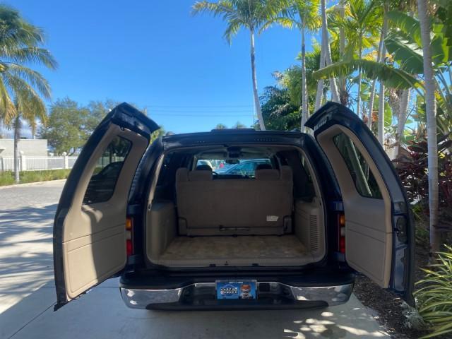 2003 Indigo Blue Metallic /Tan/Neutral Chevrolet Suburban LT 1 OWNER NO ACCIDENTS (1GNEC16Z13R) with an 5.3L Vortec 5300 V8 SFI Bi-Fuel Engine engine, Automatic transmission, located at 4701 North Dixie Hwy, Pompano Beach, FL, 33064, (954) 422-2889, 26.240938, -80.123474 - OUR WEBPAGE FLORIDACARS1.COM HAS OVER 100 PHOTOS AND FREE CARFAX LINK 2003 CHEVROLET SUBURBAN 1500 LS VIN: 1GNEC16Z13R307421 1 G N E C 1 6 Z 1 3 R 3 0 7 4 2 1 4 DOOR WAGON/SPORT UTILITY 5.3L V8 F FLEX FUEL 18 MPG REAR WHEEL DRIVE Features ABS Brakes Air Conditioning Alloy Wheels AM/FM Stereo Automat - Photo#93
