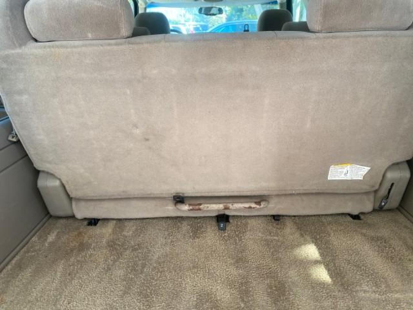 2003 Indigo Blue Metallic /Tan/Neutral Chevrolet Suburban LT 1 OWNER NO ACCIDENTS (1GNEC16Z13R) with an 5.3L Vortec 5300 V8 SFI Bi-Fuel Engine engine, Automatic transmission, located at 4701 North Dixie Hwy, Pompano Beach, FL, 33064, (954) 422-2889, 26.240938, -80.123474 - OUR WEBPAGE FLORIDACARS1.COM HAS OVER 100 PHOTOS AND FREE CARFAX LINK 2003 CHEVROLET SUBURBAN 1500 LS VIN: 1GNEC16Z13R307421 1 G N E C 1 6 Z 1 3 R 3 0 7 4 2 1 4 DOOR WAGON/SPORT UTILITY 5.3L V8 F FLEX FUEL 18 MPG REAR WHEEL DRIVE Features ABS Brakes Air Conditioning Alloy Wheels AM/FM Stereo Automat - Photo#96