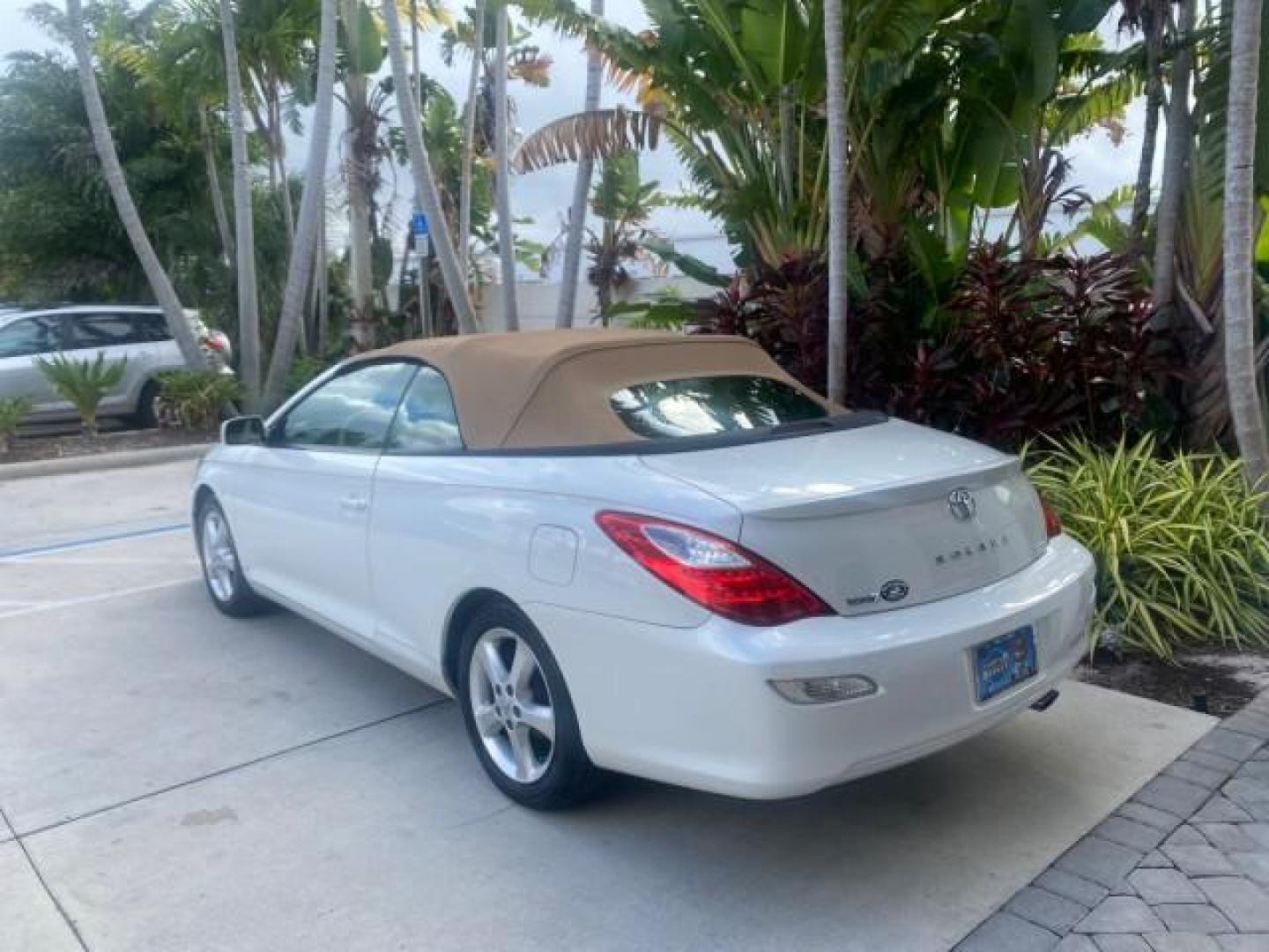2007 Blizzard Pearl /Ivory Toyota Camry Solara SLE LOW MILES 67,647 (4T1FA38P37U) with an 3.3L DOHC SMPI VVT-i 24-Valve V6 Engine engine, Automatic transmission, located at 4701 North Dixie Hwy, Pompano Beach, FL, 33064, (954) 422-2889, 26.240938, -80.123474 - OUR WEBPAGE FLORIDACARS1.COM HAS OVER 100 PHOTOS AND FREE CARFAX LINK 2007 TOYOTA CAMRY SOLARA SLE V6 VIN: 4T1FA38P37U115572 4 T 1 F A 3 8 P 3 7 U 1 1 5 5 7 2 CONVERTIBLE 3.3L V6 F DOHC 24V GASOLINE 29 MPG FRONT WHEEL DRIVE Features ABS Brakes Air Conditioning Alloy Wheels AM/FM Stereo Automatic Tra - Photo#5