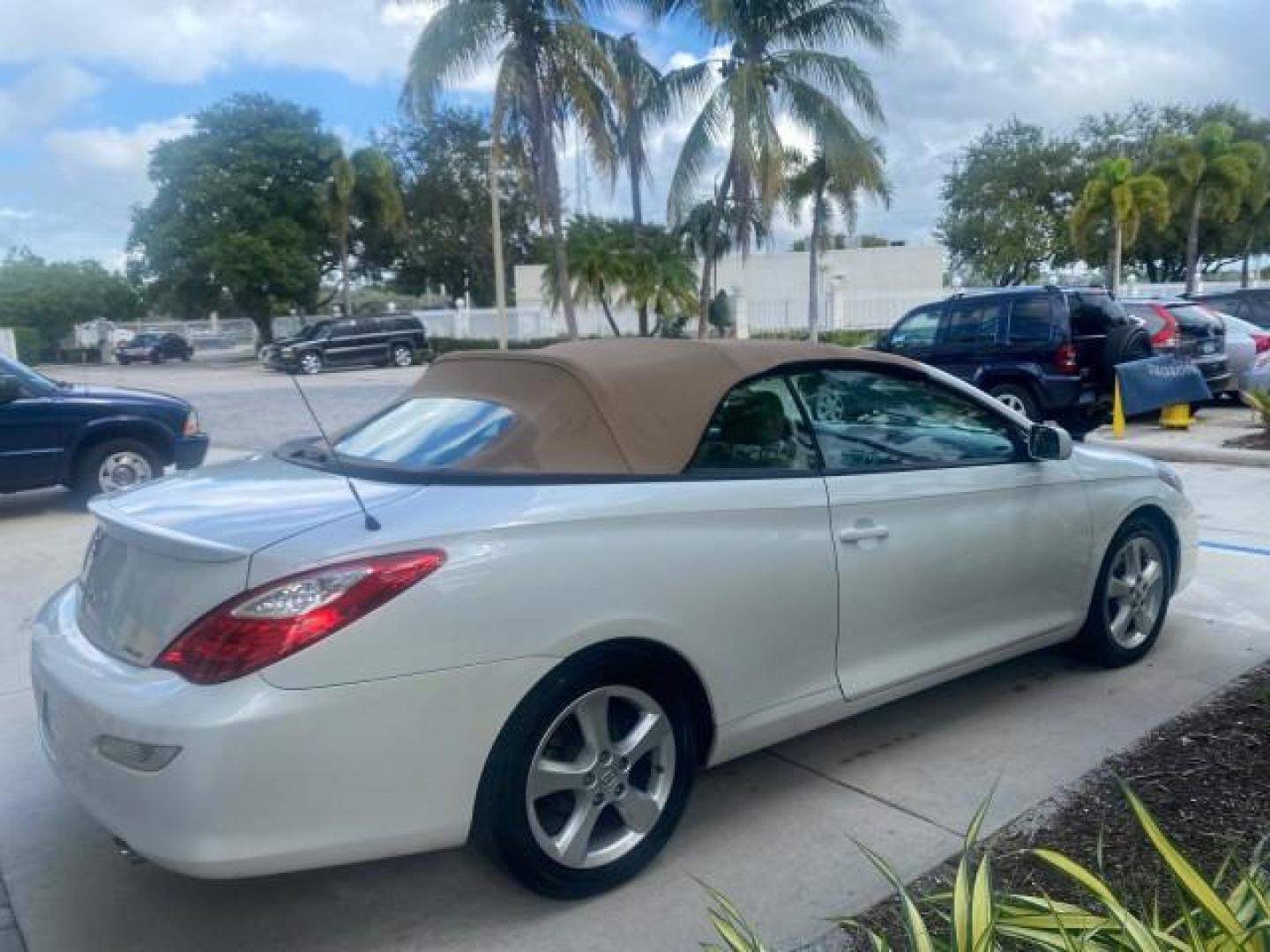 2007 Blizzard Pearl /Ivory Toyota Camry Solara SLE LOW MILES 67,647 (4T1FA38P37U) with an 3.3L DOHC SMPI VVT-i 24-Valve V6 Engine engine, Automatic transmission, located at 4701 North Dixie Hwy, Pompano Beach, FL, 33064, (954) 422-2889, 26.240938, -80.123474 - OUR WEBPAGE FLORIDACARS1.COM HAS OVER 100 PHOTOS AND FREE CARFAX LINK 2007 TOYOTA CAMRY SOLARA SLE V6 VIN: 4T1FA38P37U115572 4 T 1 F A 3 8 P 3 7 U 1 1 5 5 7 2 CONVERTIBLE 3.3L V6 F DOHC 24V GASOLINE 29 MPG FRONT WHEEL DRIVE Features ABS Brakes Air Conditioning Alloy Wheels AM/FM Stereo Automatic Tra - Photo#7