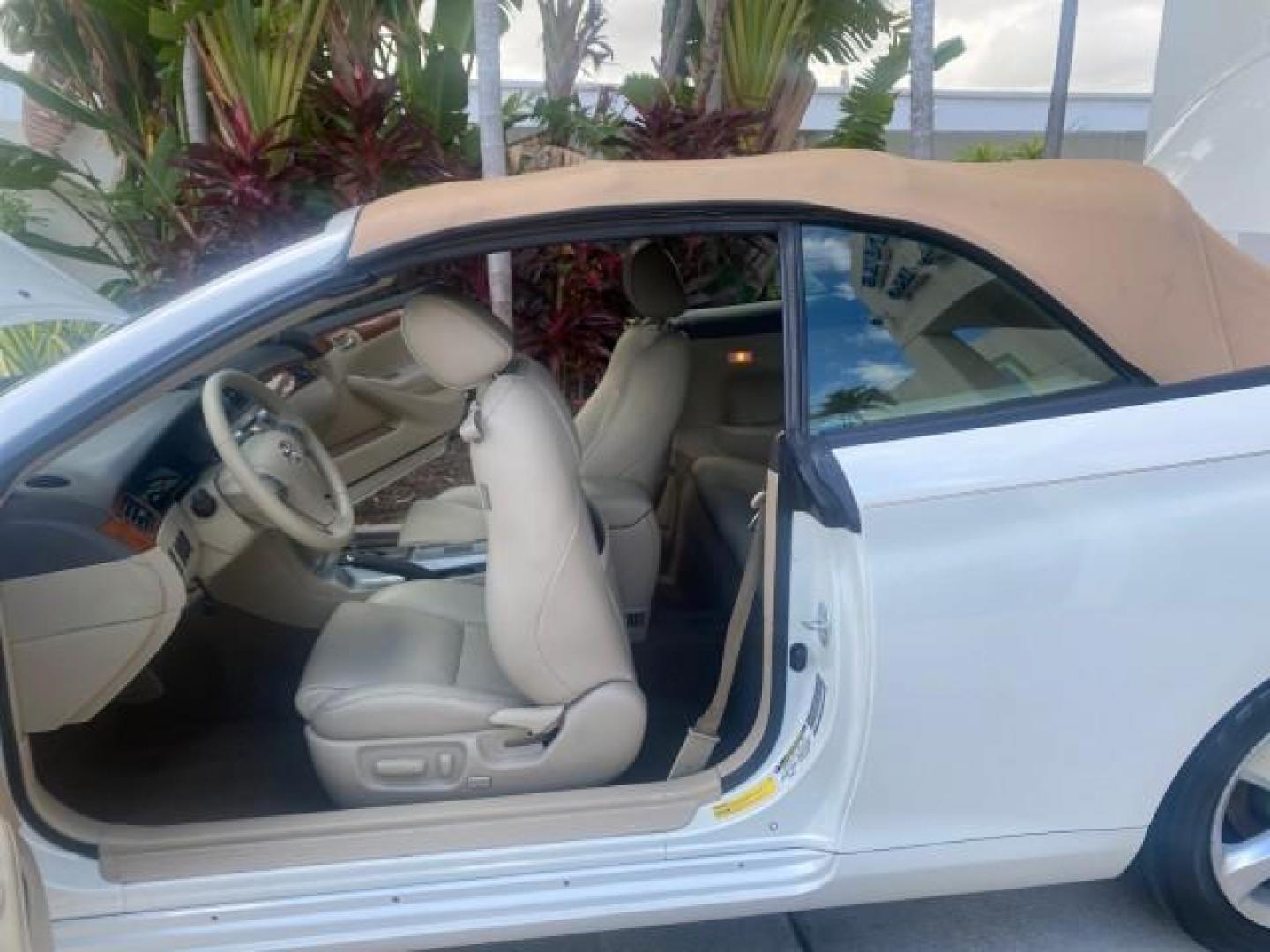 2007 Blizzard Pearl /Ivory Toyota Camry Solara SLE LOW MILES 67,647 (4T1FA38P37U) with an 3.3L DOHC SMPI VVT-i 24-Valve V6 Engine engine, Automatic transmission, located at 4701 North Dixie Hwy, Pompano Beach, FL, 33064, (954) 422-2889, 26.240938, -80.123474 - OUR WEBPAGE FLORIDACARS1.COM HAS OVER 100 PHOTOS AND FREE CARFAX LINK 2007 TOYOTA CAMRY SOLARA SLE V6 VIN: 4T1FA38P37U115572 4 T 1 F A 3 8 P 3 7 U 1 1 5 5 7 2 CONVERTIBLE 3.3L V6 F DOHC 24V GASOLINE 29 MPG FRONT WHEEL DRIVE Features ABS Brakes Air Conditioning Alloy Wheels AM/FM Stereo Automatic Tra - Photo#13