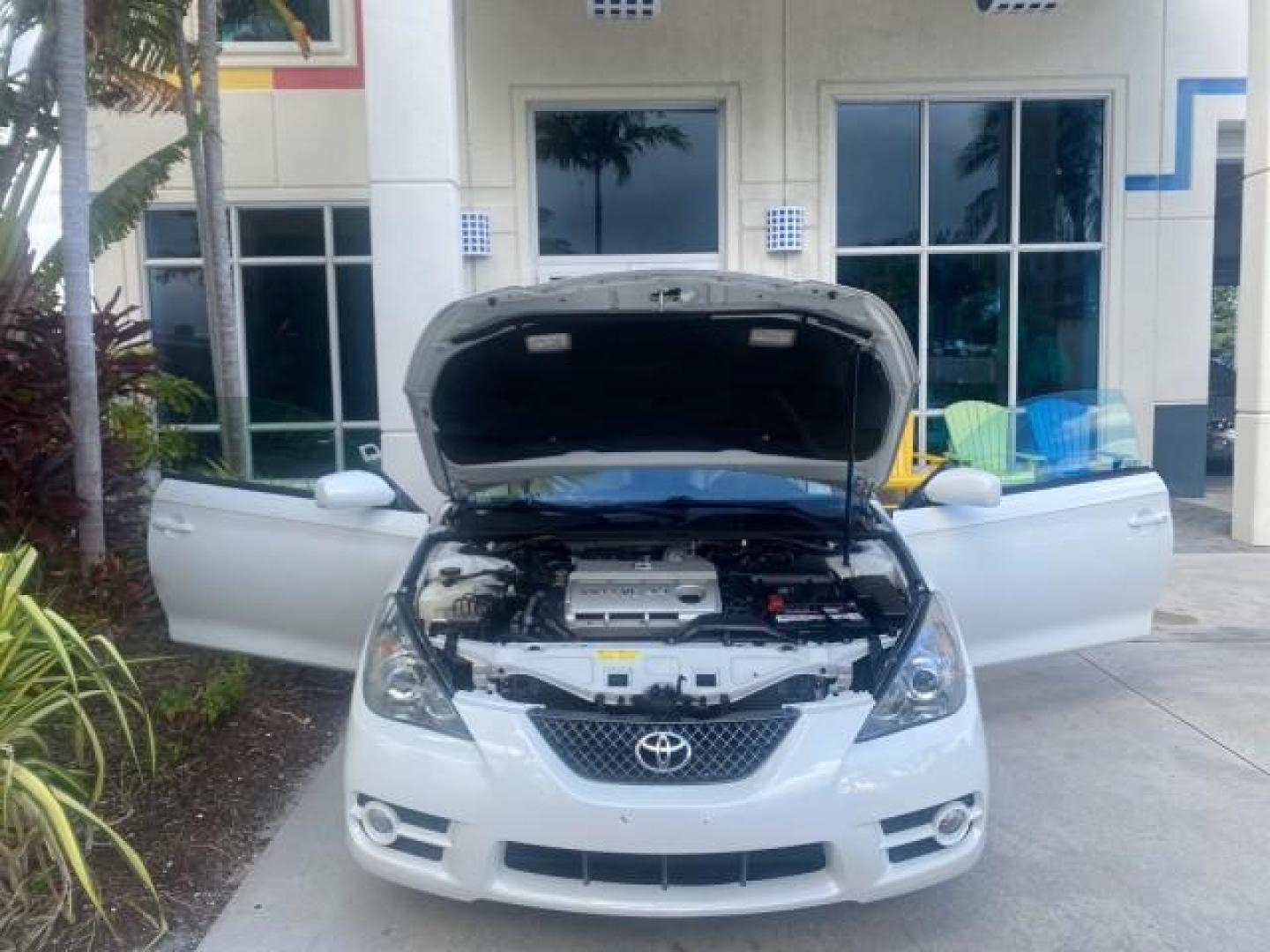 2007 Blizzard Pearl /Ivory Toyota Camry Solara SLE LOW MILES 67,647 (4T1FA38P37U) with an 3.3L DOHC SMPI VVT-i 24-Valve V6 Engine engine, Automatic transmission, located at 4701 North Dixie Hwy, Pompano Beach, FL, 33064, (954) 422-2889, 26.240938, -80.123474 - OUR WEBPAGE FLORIDACARS1.COM HAS OVER 100 PHOTOS AND FREE CARFAX LINK 2007 TOYOTA CAMRY SOLARA SLE V6 VIN: 4T1FA38P37U115572 4 T 1 F A 3 8 P 3 7 U 1 1 5 5 7 2 CONVERTIBLE 3.3L V6 F DOHC 24V GASOLINE 29 MPG FRONT WHEEL DRIVE Features ABS Brakes Air Conditioning Alloy Wheels AM/FM Stereo Automatic Tra - Photo#17