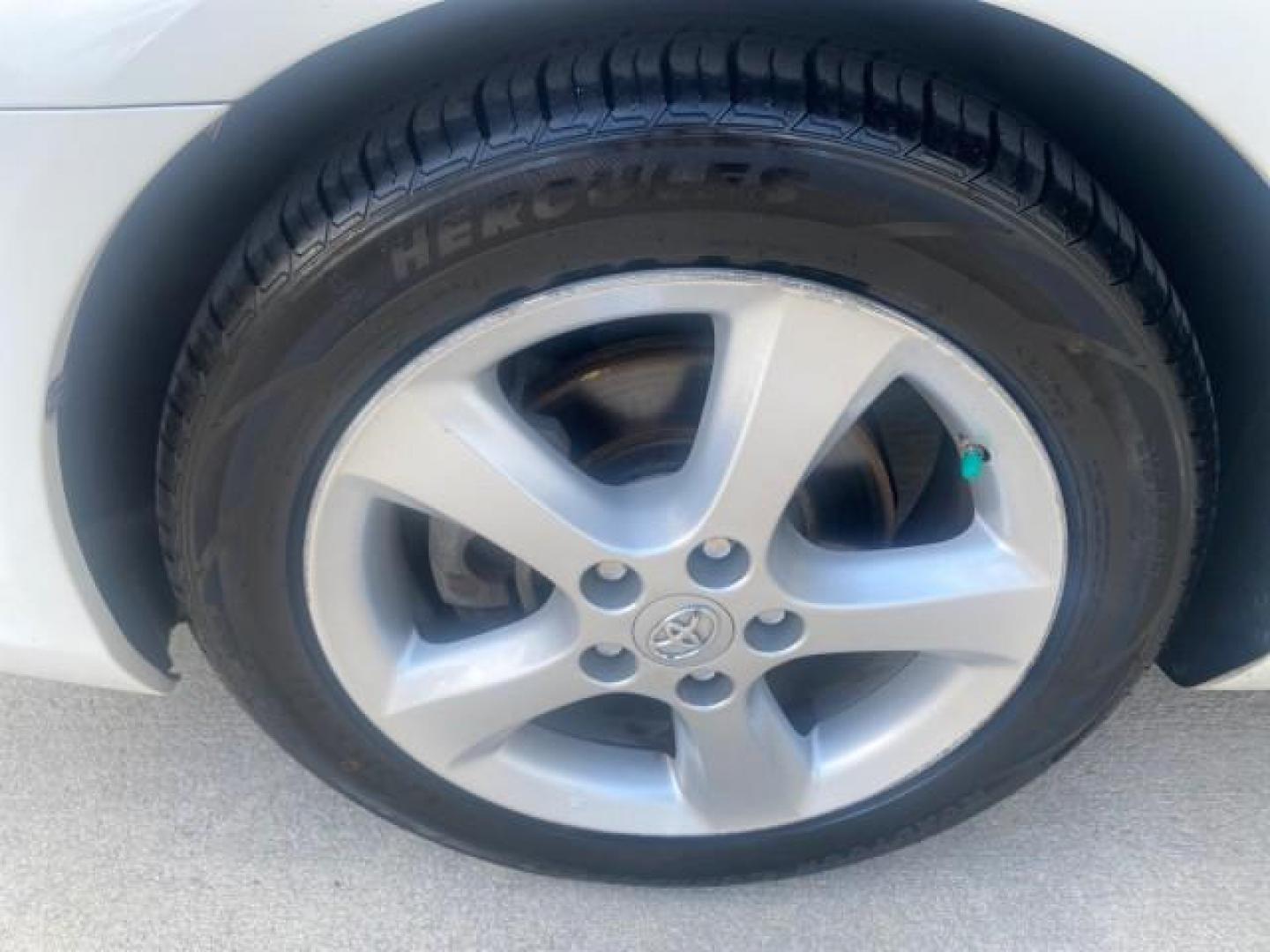 2007 Blizzard Pearl /Ivory Toyota Camry Solara SLE LOW MILES 67,647 (4T1FA38P37U) with an 3.3L DOHC SMPI VVT-i 24-Valve V6 Engine engine, Automatic transmission, located at 4701 North Dixie Hwy, Pompano Beach, FL, 33064, (954) 422-2889, 26.240938, -80.123474 - OUR WEBPAGE FLORIDACARS1.COM HAS OVER 100 PHOTOS AND FREE CARFAX LINK 2007 TOYOTA CAMRY SOLARA SLE V6 VIN: 4T1FA38P37U115572 4 T 1 F A 3 8 P 3 7 U 1 1 5 5 7 2 CONVERTIBLE 3.3L V6 F DOHC 24V GASOLINE 29 MPG FRONT WHEEL DRIVE Features ABS Brakes Air Conditioning Alloy Wheels AM/FM Stereo Automatic Tra - Photo#19