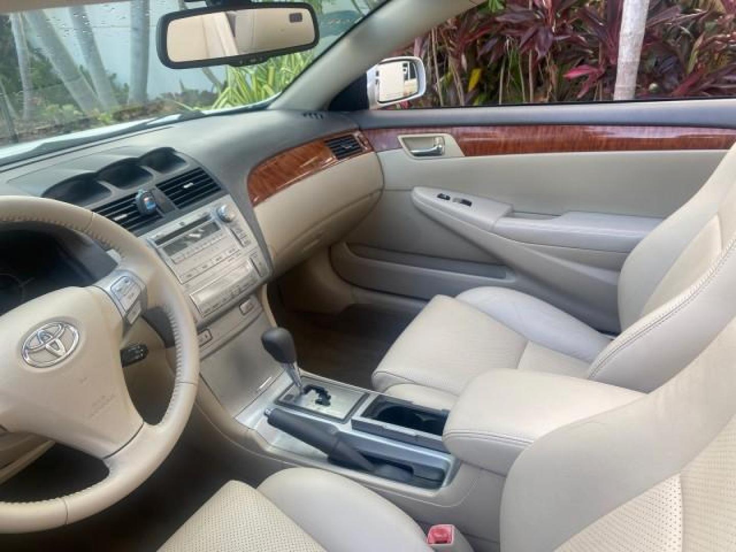 2007 Blizzard Pearl /Ivory Toyota Camry Solara SLE LOW MILES 67,647 (4T1FA38P37U) with an 3.3L DOHC SMPI VVT-i 24-Valve V6 Engine engine, Automatic transmission, located at 4701 North Dixie Hwy, Pompano Beach, FL, 33064, (954) 422-2889, 26.240938, -80.123474 - OUR WEBPAGE FLORIDACARS1.COM HAS OVER 100 PHOTOS AND FREE CARFAX LINK 2007 TOYOTA CAMRY SOLARA SLE V6 VIN: 4T1FA38P37U115572 4 T 1 F A 3 8 P 3 7 U 1 1 5 5 7 2 CONVERTIBLE 3.3L V6 F DOHC 24V GASOLINE 29 MPG FRONT WHEEL DRIVE Features ABS Brakes Air Conditioning Alloy Wheels AM/FM Stereo Automatic Tra - Photo#50