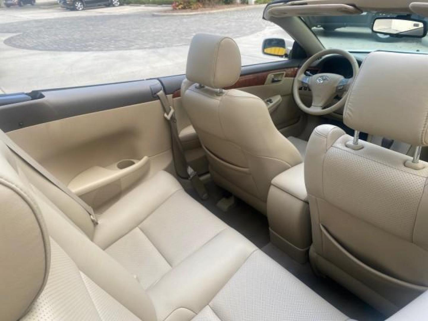 2007 Blizzard Pearl /Ivory Toyota Camry Solara SLE LOW MILES 67,647 (4T1FA38P37U) with an 3.3L DOHC SMPI VVT-i 24-Valve V6 Engine engine, Automatic transmission, located at 4701 North Dixie Hwy, Pompano Beach, FL, 33064, (954) 422-2889, 26.240938, -80.123474 - OUR WEBPAGE FLORIDACARS1.COM HAS OVER 100 PHOTOS AND FREE CARFAX LINK 2007 TOYOTA CAMRY SOLARA SLE V6 VIN: 4T1FA38P37U115572 4 T 1 F A 3 8 P 3 7 U 1 1 5 5 7 2 CONVERTIBLE 3.3L V6 F DOHC 24V GASOLINE 29 MPG FRONT WHEEL DRIVE Features ABS Brakes Air Conditioning Alloy Wheels AM/FM Stereo Automatic Tra - Photo#52