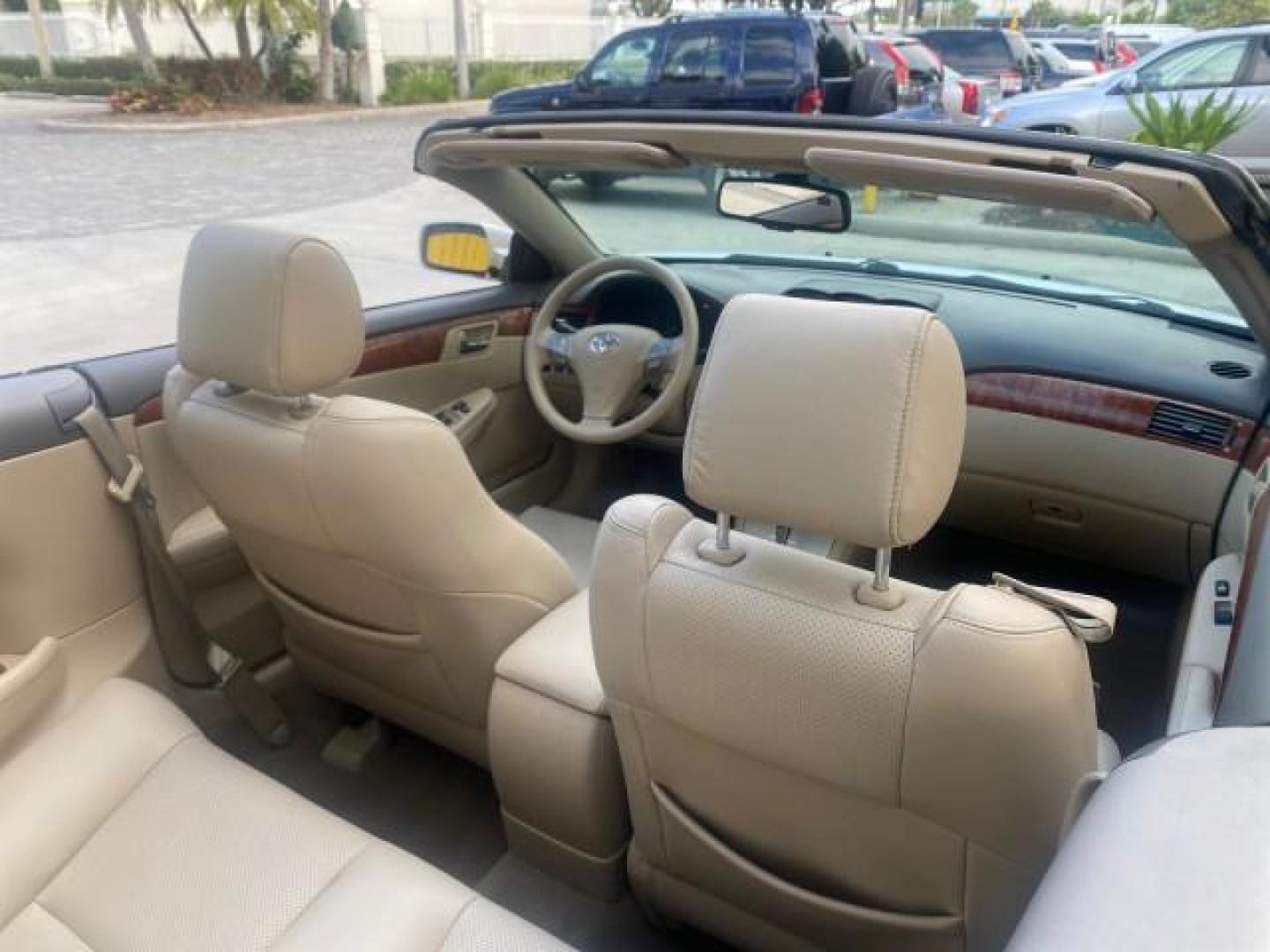 2007 Blizzard Pearl /Ivory Toyota Camry Solara SLE LOW MILES 67,647 (4T1FA38P37U) with an 3.3L DOHC SMPI VVT-i 24-Valve V6 Engine engine, Automatic transmission, located at 4701 North Dixie Hwy, Pompano Beach, FL, 33064, (954) 422-2889, 26.240938, -80.123474 - OUR WEBPAGE FLORIDACARS1.COM HAS OVER 100 PHOTOS AND FREE CARFAX LINK 2007 TOYOTA CAMRY SOLARA SLE V6 VIN: 4T1FA38P37U115572 4 T 1 F A 3 8 P 3 7 U 1 1 5 5 7 2 CONVERTIBLE 3.3L V6 F DOHC 24V GASOLINE 29 MPG FRONT WHEEL DRIVE Features ABS Brakes Air Conditioning Alloy Wheels AM/FM Stereo Automatic Tra - Photo#53