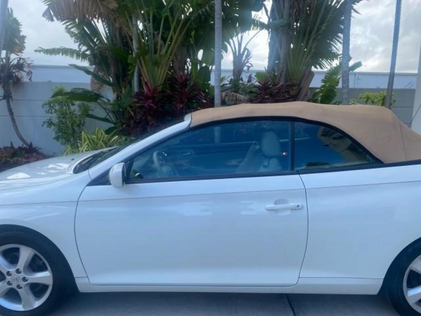 2007 Blizzard Pearl /Ivory Toyota Camry Solara SLE LOW MILES 67,647 (4T1FA38P37U) with an 3.3L DOHC SMPI VVT-i 24-Valve V6 Engine engine, Automatic transmission, located at 4701 North Dixie Hwy, Pompano Beach, FL, 33064, (954) 422-2889, 26.240938, -80.123474 - OUR WEBPAGE FLORIDACARS1.COM HAS OVER 100 PHOTOS AND FREE CARFAX LINK 2007 TOYOTA CAMRY SOLARA SLE V6 VIN: 4T1FA38P37U115572 4 T 1 F A 3 8 P 3 7 U 1 1 5 5 7 2 CONVERTIBLE 3.3L V6 F DOHC 24V GASOLINE 29 MPG FRONT WHEEL DRIVE Features ABS Brakes Air Conditioning Alloy Wheels AM/FM Stereo Automatic Tra - Photo#56