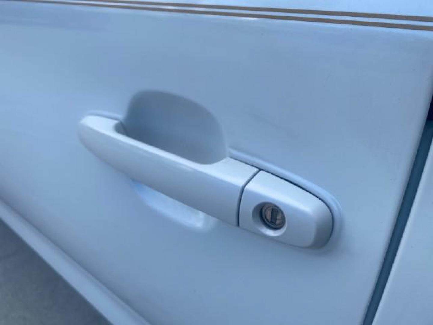 2007 Blizzard Pearl /Ivory Toyota Camry Solara SLE LOW MILES 67,647 (4T1FA38P37U) with an 3.3L DOHC SMPI VVT-i 24-Valve V6 Engine engine, Automatic transmission, located at 4701 North Dixie Hwy, Pompano Beach, FL, 33064, (954) 422-2889, 26.240938, -80.123474 - OUR WEBPAGE FLORIDACARS1.COM HAS OVER 100 PHOTOS AND FREE CARFAX LINK 2007 TOYOTA CAMRY SOLARA SLE V6 VIN: 4T1FA38P37U115572 4 T 1 F A 3 8 P 3 7 U 1 1 5 5 7 2 CONVERTIBLE 3.3L V6 F DOHC 24V GASOLINE 29 MPG FRONT WHEEL DRIVE Features ABS Brakes Air Conditioning Alloy Wheels AM/FM Stereo Automatic Tra - Photo#57