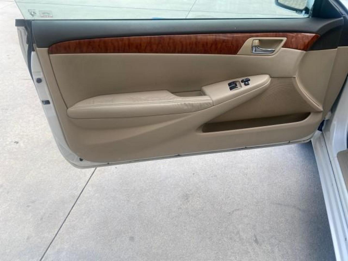 2007 Blizzard Pearl /Ivory Toyota Camry Solara SLE LOW MILES 67,647 (4T1FA38P37U) with an 3.3L DOHC SMPI VVT-i 24-Valve V6 Engine engine, Automatic transmission, located at 4701 North Dixie Hwy, Pompano Beach, FL, 33064, (954) 422-2889, 26.240938, -80.123474 - OUR WEBPAGE FLORIDACARS1.COM HAS OVER 100 PHOTOS AND FREE CARFAX LINK 2007 TOYOTA CAMRY SOLARA SLE V6 VIN: 4T1FA38P37U115572 4 T 1 F A 3 8 P 3 7 U 1 1 5 5 7 2 CONVERTIBLE 3.3L V6 F DOHC 24V GASOLINE 29 MPG FRONT WHEEL DRIVE Features ABS Brakes Air Conditioning Alloy Wheels AM/FM Stereo Automatic Tra - Photo#59