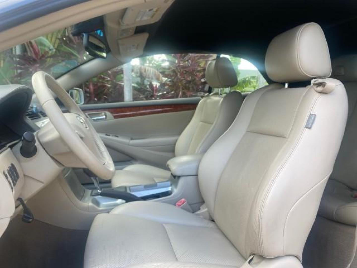 2007 Blizzard Pearl /Ivory Toyota Camry Solara SLE LOW MILES 67,647 (4T1FA38P37U) with an 3.3L DOHC SMPI VVT-i 24-Valve V6 Engine engine, Automatic transmission, located at 4701 North Dixie Hwy, Pompano Beach, FL, 33064, (954) 422-2889, 26.240938, -80.123474 - OUR WEBPAGE FLORIDACARS1.COM HAS OVER 100 PHOTOS AND FREE CARFAX LINK 2007 TOYOTA CAMRY SOLARA SLE V6 VIN: 4T1FA38P37U115572 4 T 1 F A 3 8 P 3 7 U 1 1 5 5 7 2 CONVERTIBLE 3.3L V6 F DOHC 24V GASOLINE 29 MPG FRONT WHEEL DRIVE Features ABS Brakes Air Conditioning Alloy Wheels AM/FM Stereo Automatic Tra - Photo#60