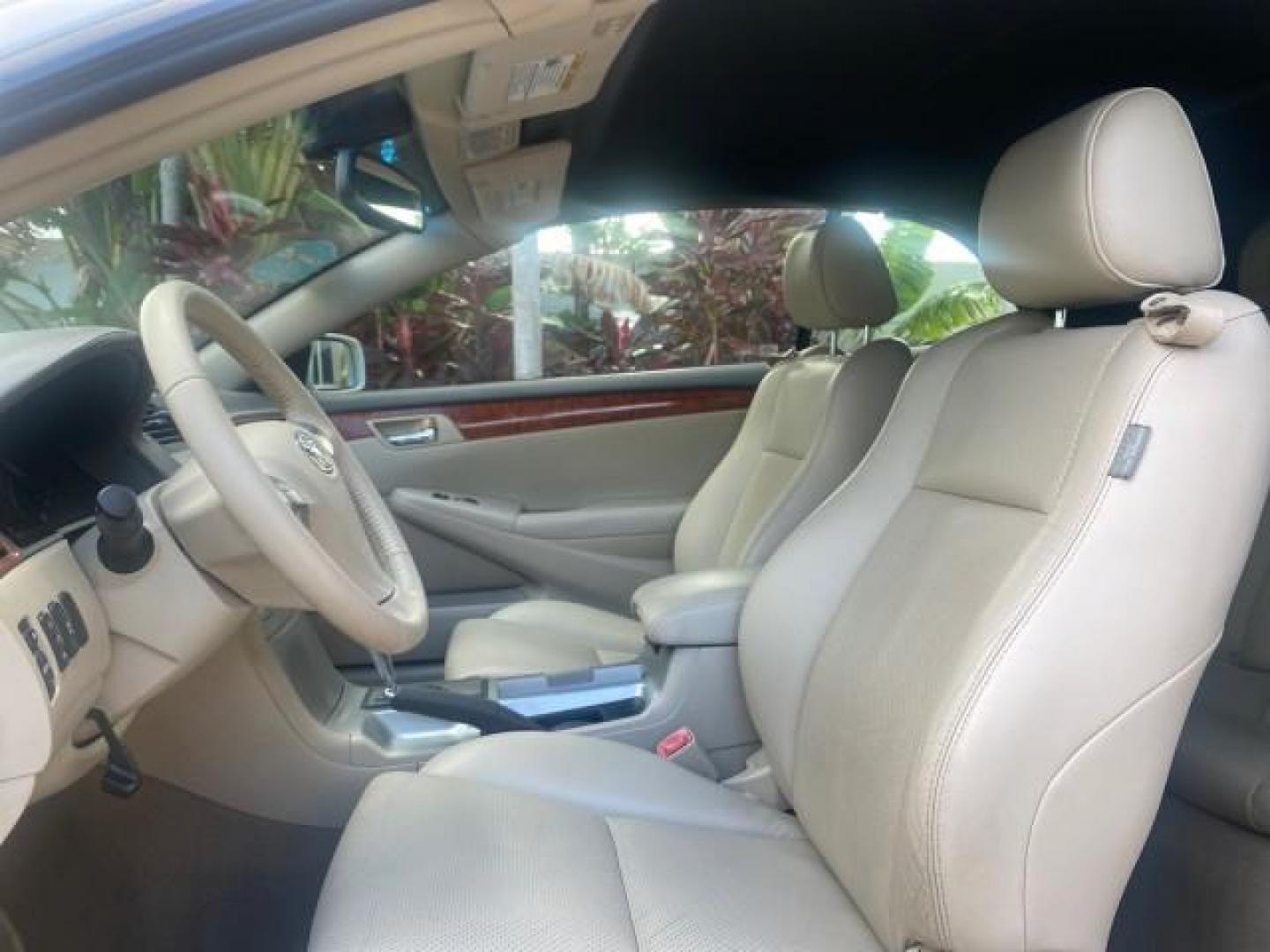 2007 Blizzard Pearl /Ivory Toyota Camry Solara SLE LOW MILES 67,647 (4T1FA38P37U) with an 3.3L DOHC SMPI VVT-i 24-Valve V6 Engine engine, Automatic transmission, located at 4701 North Dixie Hwy, Pompano Beach, FL, 33064, (954) 422-2889, 26.240938, -80.123474 - OUR WEBPAGE FLORIDACARS1.COM HAS OVER 100 PHOTOS AND FREE CARFAX LINK 2007 TOYOTA CAMRY SOLARA SLE V6 VIN: 4T1FA38P37U115572 4 T 1 F A 3 8 P 3 7 U 1 1 5 5 7 2 CONVERTIBLE 3.3L V6 F DOHC 24V GASOLINE 29 MPG FRONT WHEEL DRIVE Features ABS Brakes Air Conditioning Alloy Wheels AM/FM Stereo Automatic Tra - Photo#61