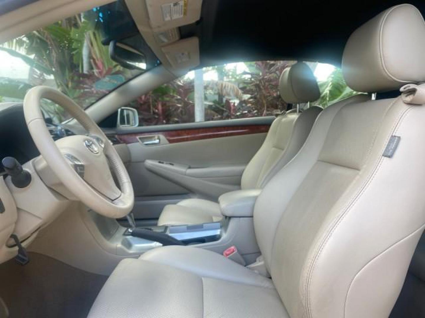 2007 Blizzard Pearl /Ivory Toyota Camry Solara SLE LOW MILES 67,647 (4T1FA38P37U) with an 3.3L DOHC SMPI VVT-i 24-Valve V6 Engine engine, Automatic transmission, located at 4701 North Dixie Hwy, Pompano Beach, FL, 33064, (954) 422-2889, 26.240938, -80.123474 - OUR WEBPAGE FLORIDACARS1.COM HAS OVER 100 PHOTOS AND FREE CARFAX LINK 2007 TOYOTA CAMRY SOLARA SLE V6 VIN: 4T1FA38P37U115572 4 T 1 F A 3 8 P 3 7 U 1 1 5 5 7 2 CONVERTIBLE 3.3L V6 F DOHC 24V GASOLINE 29 MPG FRONT WHEEL DRIVE Features ABS Brakes Air Conditioning Alloy Wheels AM/FM Stereo Automatic Tra - Photo#62