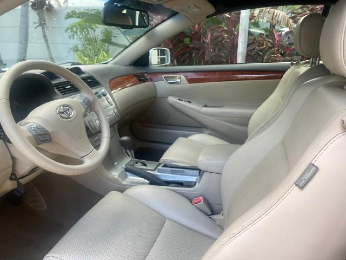 2007 Blizzard Pearl /Ivory Toyota Camry Solara SLE LOW MILES 67,647 (4T1FA38P37U) with an 3.3L DOHC SMPI VVT-i 24-Valve V6 Engine engine, Automatic transmission, located at 4701 North Dixie Hwy, Pompano Beach, FL, 33064, (954) 422-2889, 26.240938, -80.123474 - OUR WEBPAGE FLORIDACARS1.COM HAS OVER 100 PHOTOS AND FREE CARFAX LINK 2007 TOYOTA CAMRY SOLARA SLE V6 VIN: 4T1FA38P37U115572 4 T 1 F A 3 8 P 3 7 U 1 1 5 5 7 2 CONVERTIBLE 3.3L V6 F DOHC 24V GASOLINE 29 MPG FRONT WHEEL DRIVE Features ABS Brakes Air Conditioning Alloy Wheels AM/FM Stereo Automatic Tra - Photo#63