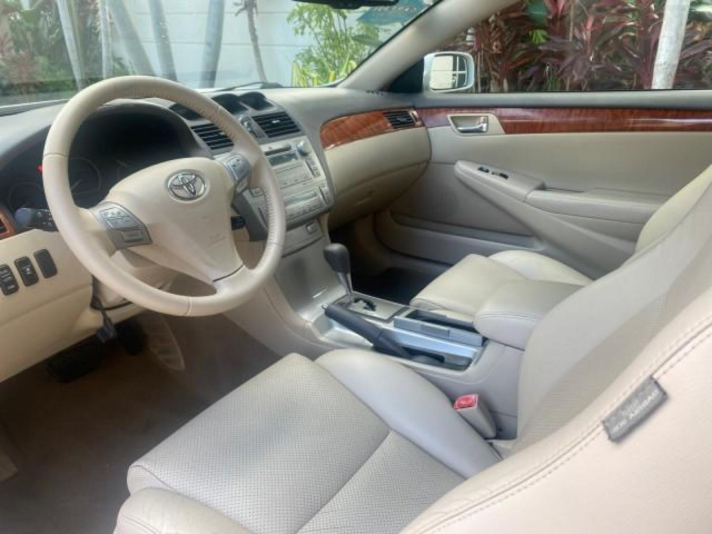 2007 Blizzard Pearl /Ivory Toyota Camry Solara SLE LOW MILES 67,647 (4T1FA38P37U) with an 3.3L DOHC SMPI VVT-i 24-Valve V6 Engine engine, Automatic transmission, located at 4701 North Dixie Hwy, Pompano Beach, FL, 33064, (954) 422-2889, 26.240938, -80.123474 - OUR WEBPAGE FLORIDACARS1.COM HAS OVER 100 PHOTOS AND FREE CARFAX LINK 2007 TOYOTA CAMRY SOLARA SLE V6 VIN: 4T1FA38P37U115572 4 T 1 F A 3 8 P 3 7 U 1 1 5 5 7 2 CONVERTIBLE 3.3L V6 F DOHC 24V GASOLINE 29 MPG FRONT WHEEL DRIVE Features ABS Brakes Air Conditioning Alloy Wheels AM/FM Stereo Automatic Tra - Photo#64