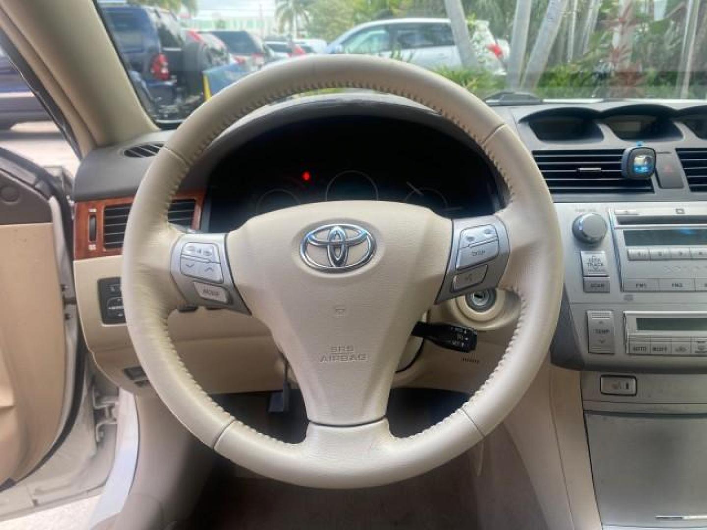 2007 Blizzard Pearl /Ivory Toyota Camry Solara SLE LOW MILES 67,647 (4T1FA38P37U) with an 3.3L DOHC SMPI VVT-i 24-Valve V6 Engine engine, Automatic transmission, located at 4701 North Dixie Hwy, Pompano Beach, FL, 33064, (954) 422-2889, 26.240938, -80.123474 - OUR WEBPAGE FLORIDACARS1.COM HAS OVER 100 PHOTOS AND FREE CARFAX LINK 2007 TOYOTA CAMRY SOLARA SLE V6 VIN: 4T1FA38P37U115572 4 T 1 F A 3 8 P 3 7 U 1 1 5 5 7 2 CONVERTIBLE 3.3L V6 F DOHC 24V GASOLINE 29 MPG FRONT WHEEL DRIVE Features ABS Brakes Air Conditioning Alloy Wheels AM/FM Stereo Automatic Tra - Photo#66