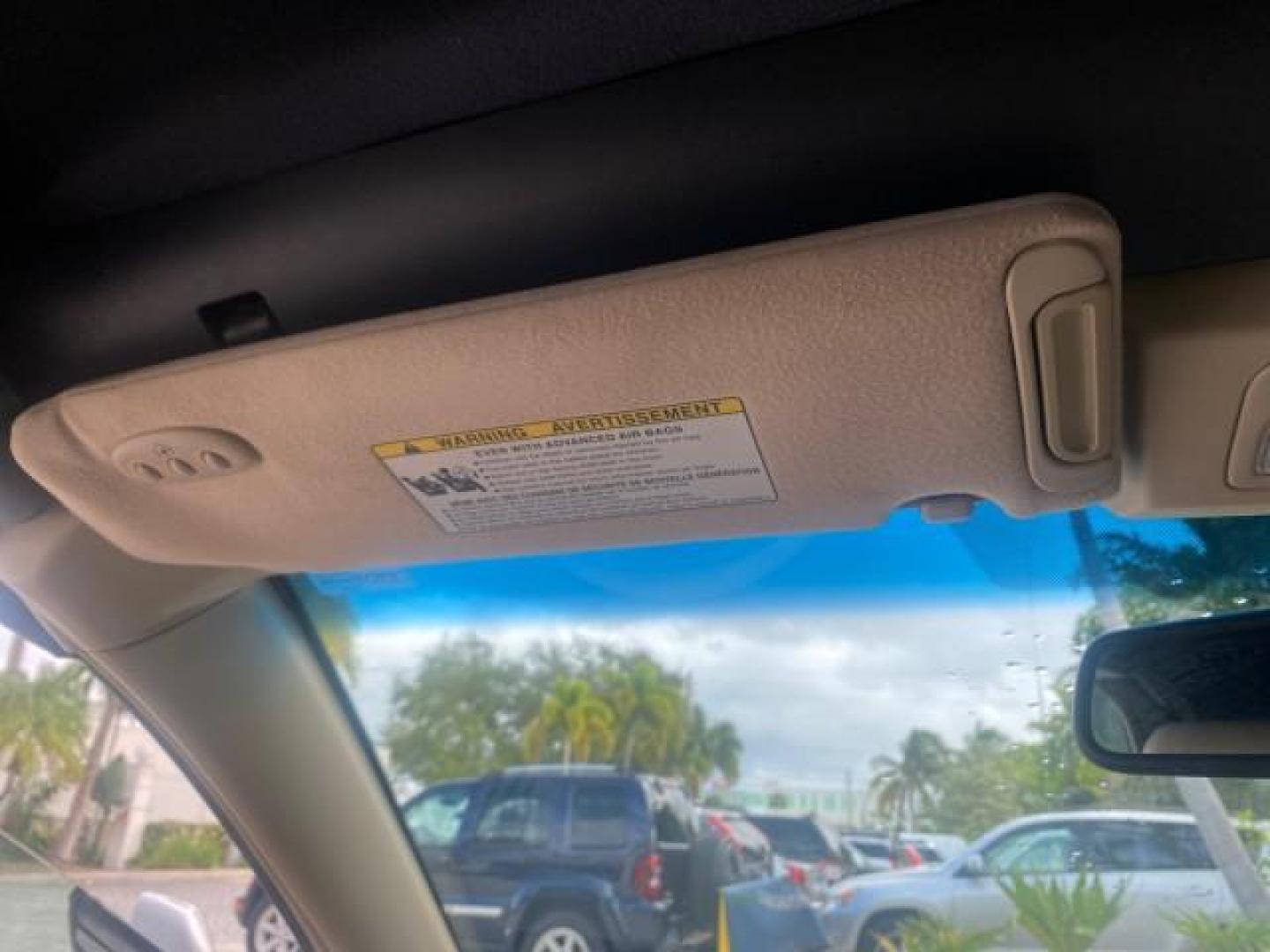 2007 Blizzard Pearl /Ivory Toyota Camry Solara SLE LOW MILES 67,647 (4T1FA38P37U) with an 3.3L DOHC SMPI VVT-i 24-Valve V6 Engine engine, Automatic transmission, located at 4701 North Dixie Hwy, Pompano Beach, FL, 33064, (954) 422-2889, 26.240938, -80.123474 - OUR WEBPAGE FLORIDACARS1.COM HAS OVER 100 PHOTOS AND FREE CARFAX LINK 2007 TOYOTA CAMRY SOLARA SLE V6 VIN: 4T1FA38P37U115572 4 T 1 F A 3 8 P 3 7 U 1 1 5 5 7 2 CONVERTIBLE 3.3L V6 F DOHC 24V GASOLINE 29 MPG FRONT WHEEL DRIVE Features ABS Brakes Air Conditioning Alloy Wheels AM/FM Stereo Automatic Tra - Photo#85