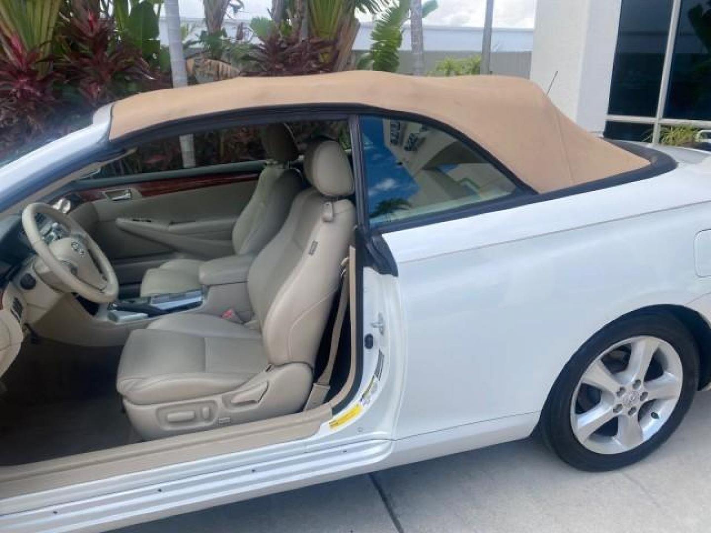 2007 Blizzard Pearl /Ivory Toyota Camry Solara SLE LOW MILES 67,647 (4T1FA38P37U) with an 3.3L DOHC SMPI VVT-i 24-Valve V6 Engine engine, Automatic transmission, located at 4701 North Dixie Hwy, Pompano Beach, FL, 33064, (954) 422-2889, 26.240938, -80.123474 - OUR WEBPAGE FLORIDACARS1.COM HAS OVER 100 PHOTOS AND FREE CARFAX LINK 2007 TOYOTA CAMRY SOLARA SLE V6 VIN: 4T1FA38P37U115572 4 T 1 F A 3 8 P 3 7 U 1 1 5 5 7 2 CONVERTIBLE 3.3L V6 F DOHC 24V GASOLINE 29 MPG FRONT WHEEL DRIVE Features ABS Brakes Air Conditioning Alloy Wheels AM/FM Stereo Automatic Tra - Photo#90