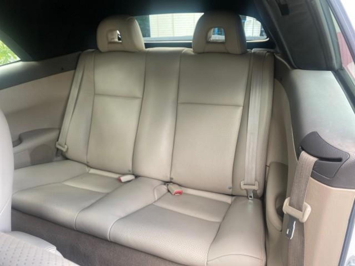 2007 Blizzard Pearl /Ivory Toyota Camry Solara SLE LOW MILES 67,647 (4T1FA38P37U) with an 3.3L DOHC SMPI VVT-i 24-Valve V6 Engine engine, Automatic transmission, located at 4701 North Dixie Hwy, Pompano Beach, FL, 33064, (954) 422-2889, 26.240938, -80.123474 - OUR WEBPAGE FLORIDACARS1.COM HAS OVER 100 PHOTOS AND FREE CARFAX LINK 2007 TOYOTA CAMRY SOLARA SLE V6 VIN: 4T1FA38P37U115572 4 T 1 F A 3 8 P 3 7 U 1 1 5 5 7 2 CONVERTIBLE 3.3L V6 F DOHC 24V GASOLINE 29 MPG FRONT WHEEL DRIVE Features ABS Brakes Air Conditioning Alloy Wheels AM/FM Stereo Automatic Tra - Photo#92