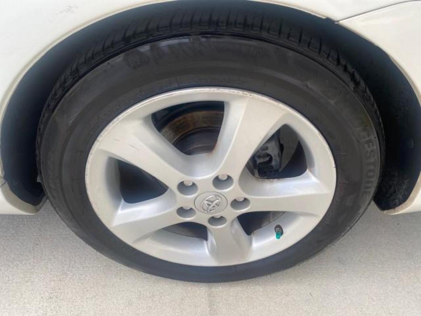 2007 Blizzard Pearl /Ivory Toyota Camry Solara SLE LOW MILES 67,647 (4T1FA38P37U) with an 3.3L DOHC SMPI VVT-i 24-Valve V6 Engine engine, Automatic transmission, located at 4701 North Dixie Hwy, Pompano Beach, FL, 33064, (954) 422-2889, 26.240938, -80.123474 - OUR WEBPAGE FLORIDACARS1.COM HAS OVER 100 PHOTOS AND FREE CARFAX LINK 2007 TOYOTA CAMRY SOLARA SLE V6 VIN: 4T1FA38P37U115572 4 T 1 F A 3 8 P 3 7 U 1 1 5 5 7 2 CONVERTIBLE 3.3L V6 F DOHC 24V GASOLINE 29 MPG FRONT WHEEL DRIVE Features ABS Brakes Air Conditioning Alloy Wheels AM/FM Stereo Automatic Tra - Photo#95