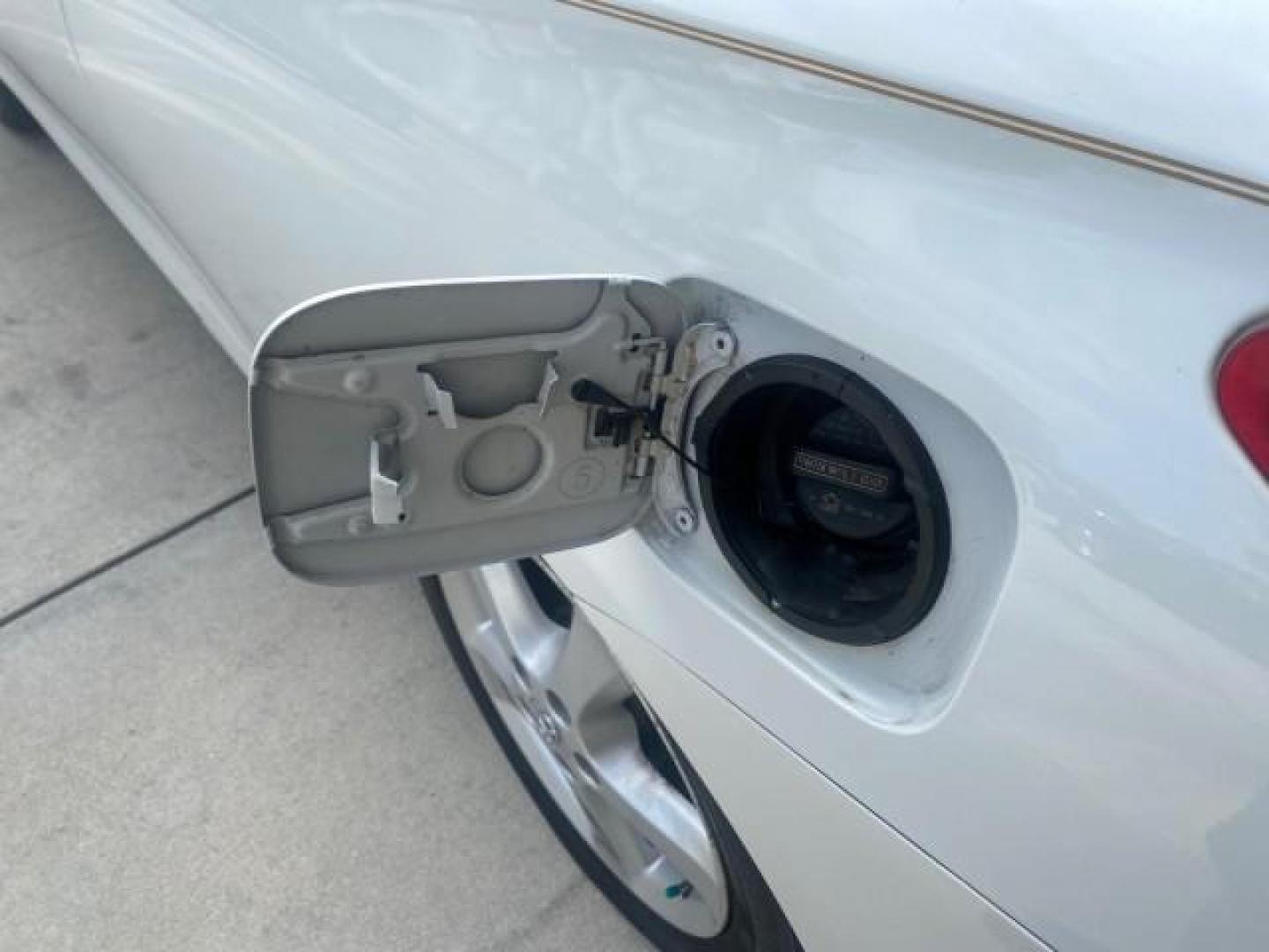 2007 Blizzard Pearl /Ivory Toyota Camry Solara SLE LOW MILES 67,647 (4T1FA38P37U) with an 3.3L DOHC SMPI VVT-i 24-Valve V6 Engine engine, Automatic transmission, located at 4701 North Dixie Hwy, Pompano Beach, FL, 33064, (954) 422-2889, 26.240938, -80.123474 - OUR WEBPAGE FLORIDACARS1.COM HAS OVER 100 PHOTOS AND FREE CARFAX LINK 2007 TOYOTA CAMRY SOLARA SLE V6 VIN: 4T1FA38P37U115572 4 T 1 F A 3 8 P 3 7 U 1 1 5 5 7 2 CONVERTIBLE 3.3L V6 F DOHC 24V GASOLINE 29 MPG FRONT WHEEL DRIVE Features ABS Brakes Air Conditioning Alloy Wheels AM/FM Stereo Automatic Tra - Photo#99