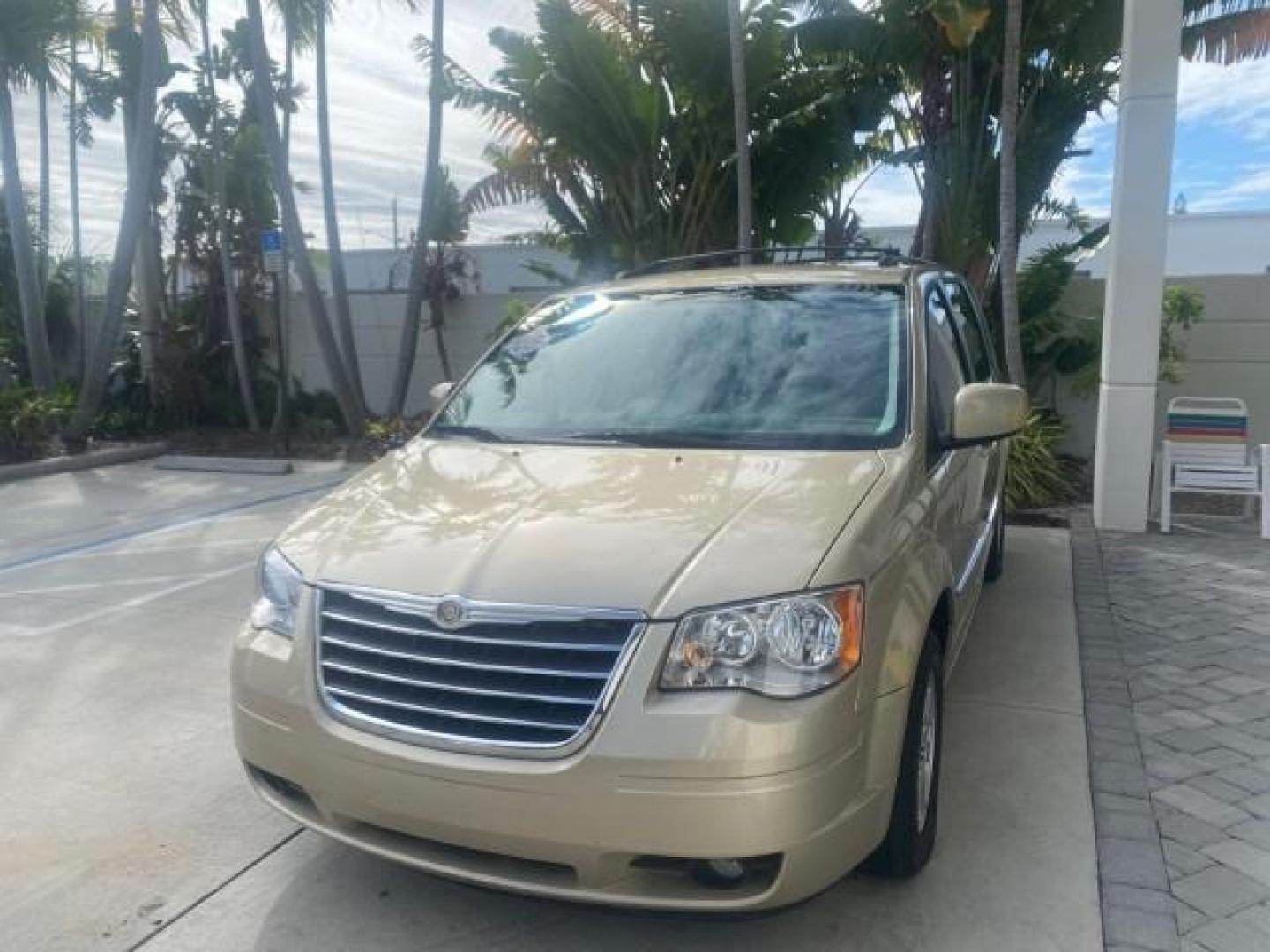 2010 White Gold /Medium pebble beige/cream Chrysler Town and Country Touring LOW MILES 33,692 1 OWNER (2A4RR5D1XAR) with an 3.8L OHV SMPI V6 Engine engine, Automatic transmission, located at 4701 North Dixie Hwy, Pompano Beach, FL, 33064, (954) 422-2889, 26.240938, -80.123474 - OUR WEBPAGE FLORIDACARS1.COM HAS OVER 100 PHOTOS AND FREE CARFAX LINK 2010 CHRYSLER TOWN AND COUNTRY TOURING VIN: 2A4RR5D1XAR392905 2 A 4 R R 5 D 1 X A R 3 9 2 9 0 5 VAN 3.8L V6 F OHV 12V GASOLINE 23 MPG FRONT WHEEL DRIVE Features ABS Brakes Air Conditioning Alloy Wheels AM/FM Stereo Automatic Trans - Photo#3