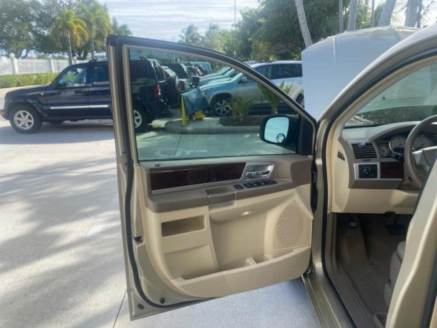 2010 White Gold /Medium pebble beige/cream Chrysler Town and Country Touring LOW MILES 33,692 1 OWNER (2A4RR5D1XAR) with an 3.8L OHV SMPI V6 Engine engine, Automatic transmission, located at 4701 North Dixie Hwy, Pompano Beach, FL, 33064, (954) 422-2889, 26.240938, -80.123474 - OUR WEBPAGE FLORIDACARS1.COM HAS OVER 100 PHOTOS AND FREE CARFAX LINK 2010 CHRYSLER TOWN AND COUNTRY TOURING VIN: 2A4RR5D1XAR392905 2 A 4 R R 5 D 1 X A R 3 9 2 9 0 5 VAN 3.8L V6 F OHV 12V GASOLINE 23 MPG FRONT WHEEL DRIVE Features ABS Brakes Air Conditioning Alloy Wheels AM/FM Stereo Automatic Trans - Photo#9