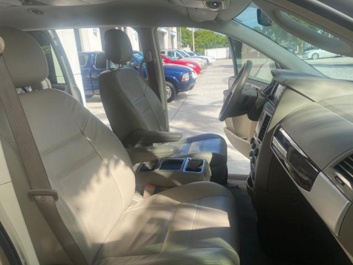 2010 White Gold /Medium pebble beige/cream Chrysler Town and Country Touring LOW MILES 33,692 1 OWNER (2A4RR5D1XAR) with an 3.8L OHV SMPI V6 Engine engine, Automatic transmission, located at 4701 North Dixie Hwy, Pompano Beach, FL, 33064, (954) 422-2889, 26.240938, -80.123474 - OUR WEBPAGE FLORIDACARS1.COM HAS OVER 100 PHOTOS AND FREE CARFAX LINK 2010 CHRYSLER TOWN AND COUNTRY TOURING VIN: 2A4RR5D1XAR392905 2 A 4 R R 5 D 1 X A R 3 9 2 9 0 5 VAN 3.8L V6 F OHV 12V GASOLINE 23 MPG FRONT WHEEL DRIVE Features ABS Brakes Air Conditioning Alloy Wheels AM/FM Stereo Automatic Trans - Photo#12